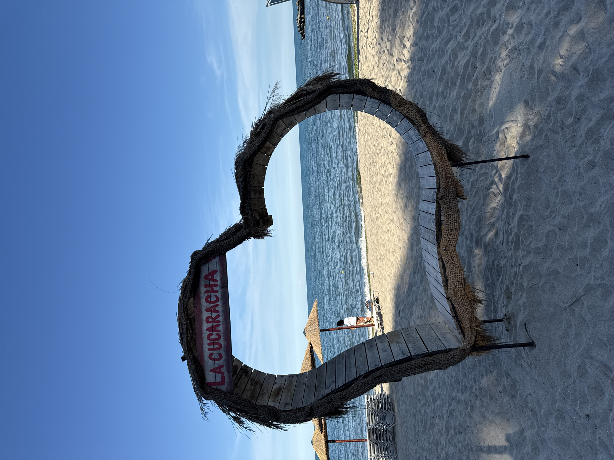 Beach bars, boardwalks, folk music, and cats in the sun