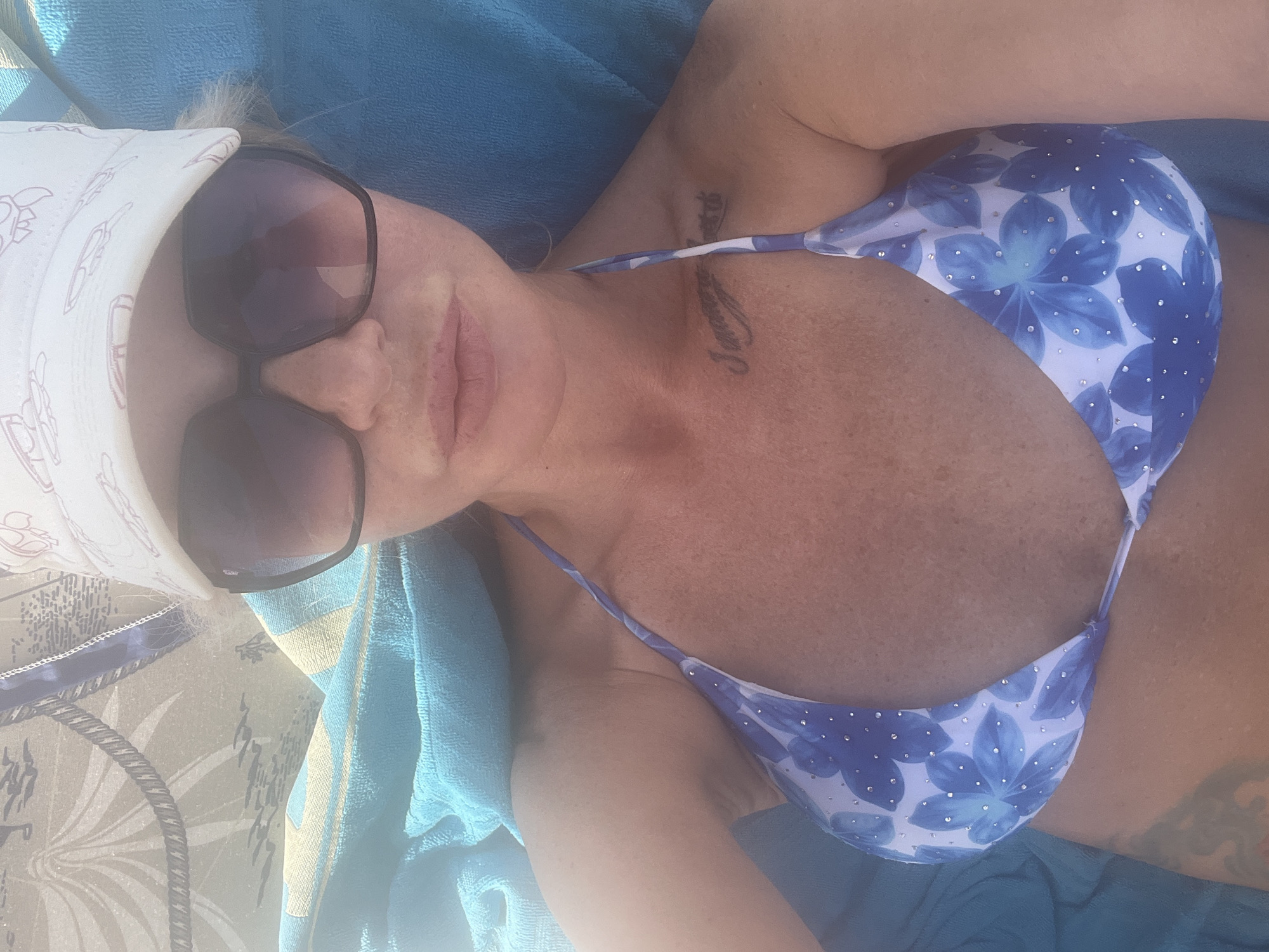 Lazy beach afternoon: sun, selfies, and cold beers