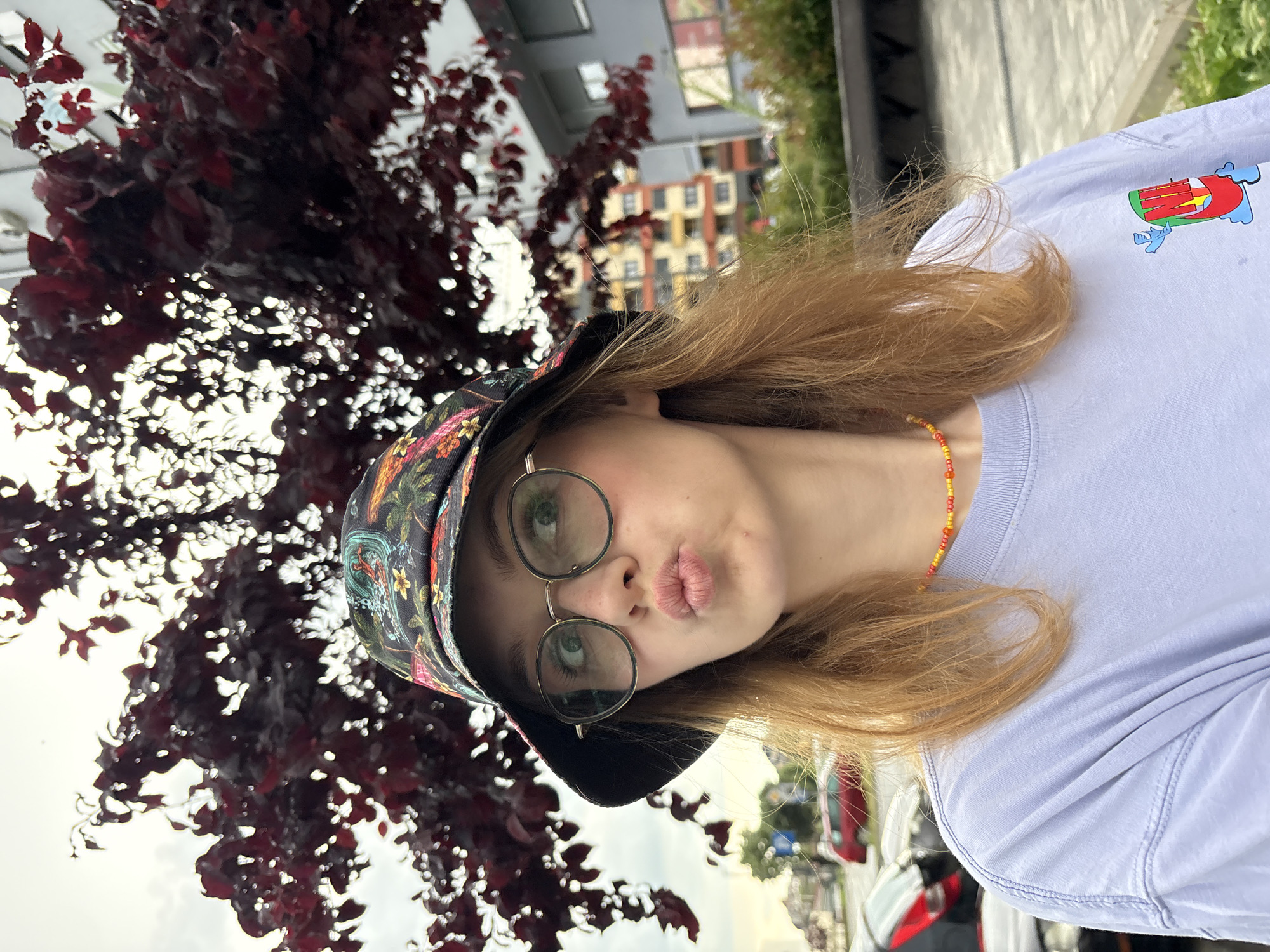 Woman captures selfies and rain-soaked roses in Kragujevac