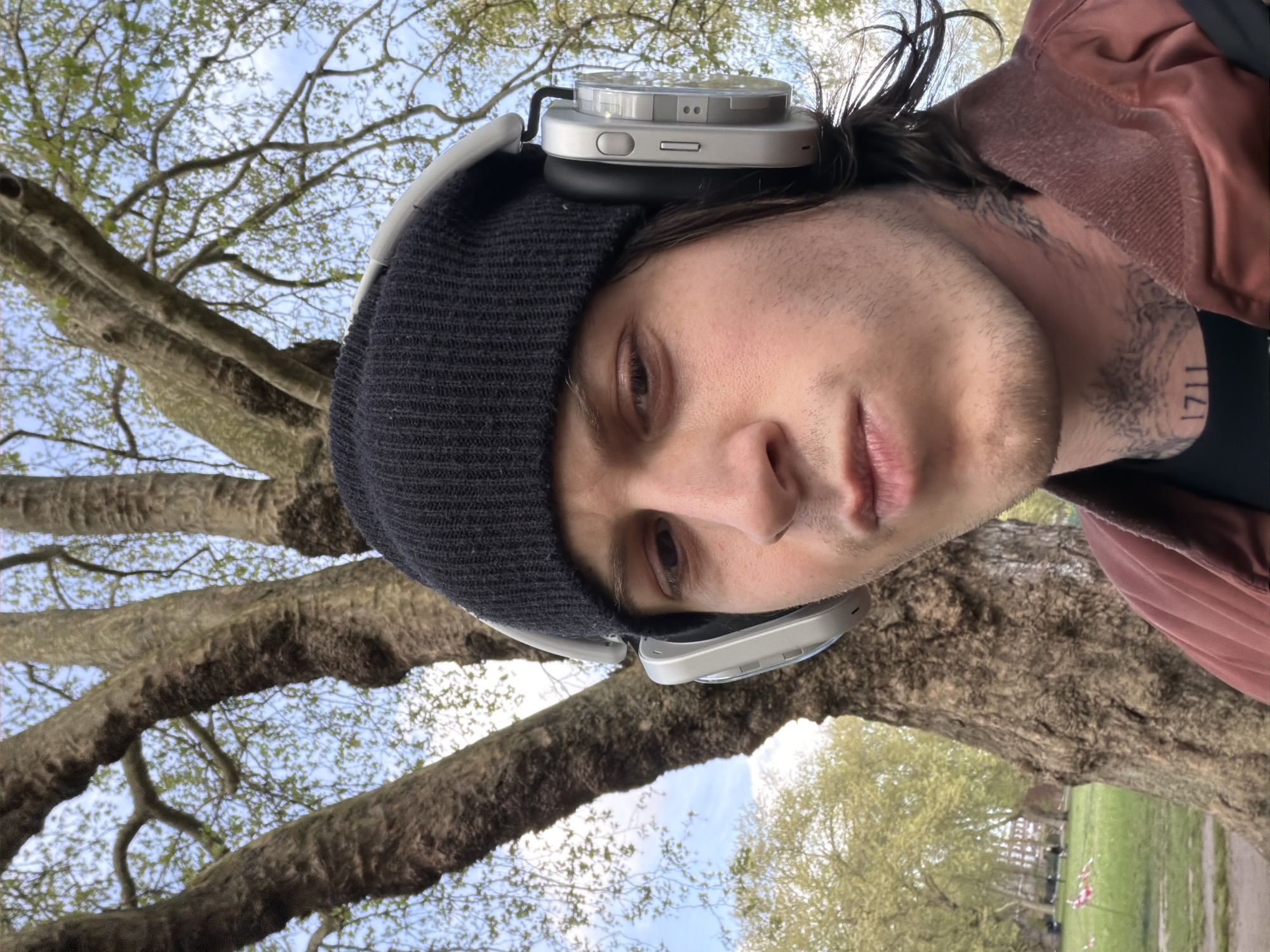 Young man photographed in various poses at London park