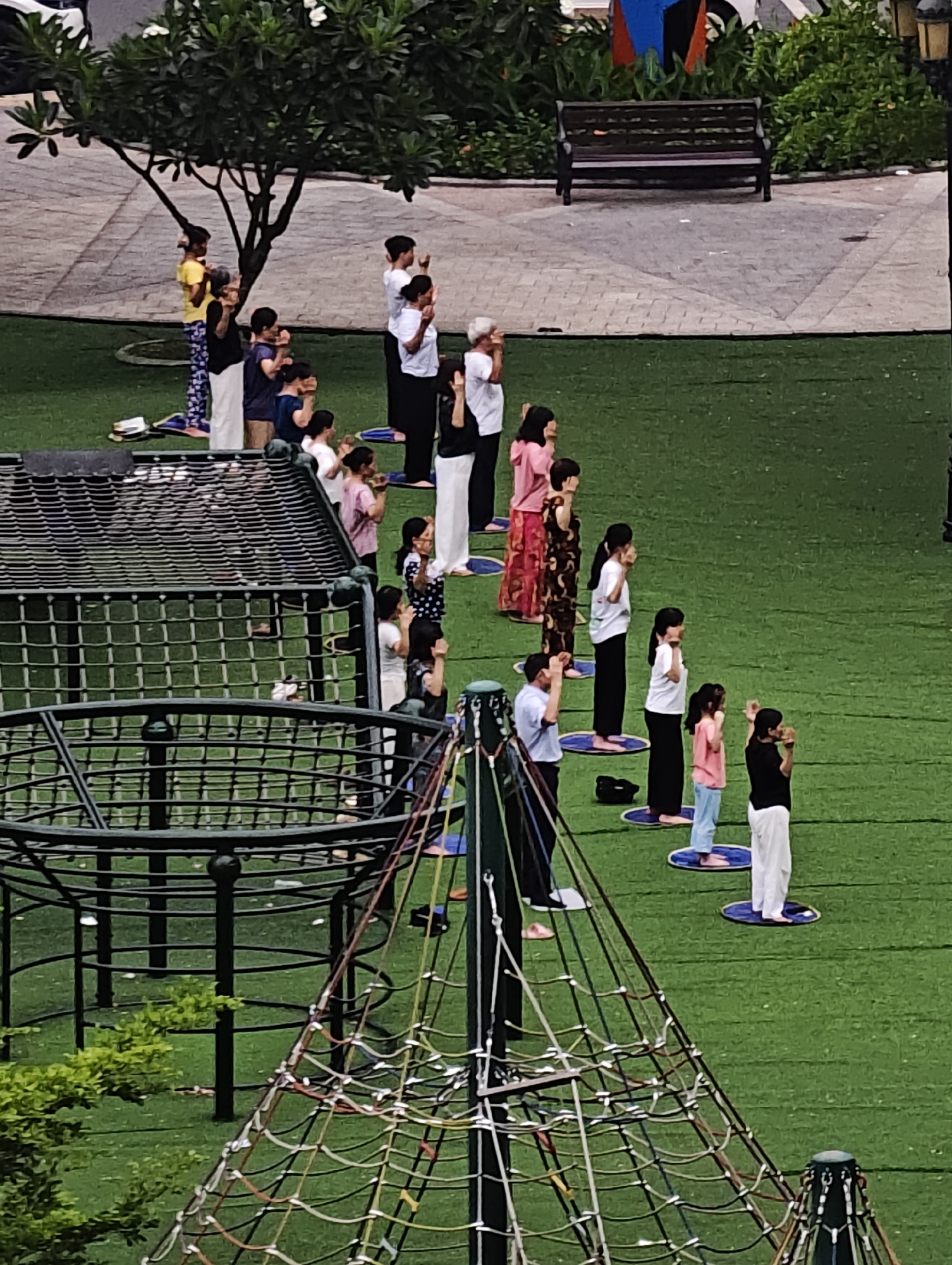 Group exercise session draws 25 participants in Hanoi public space
