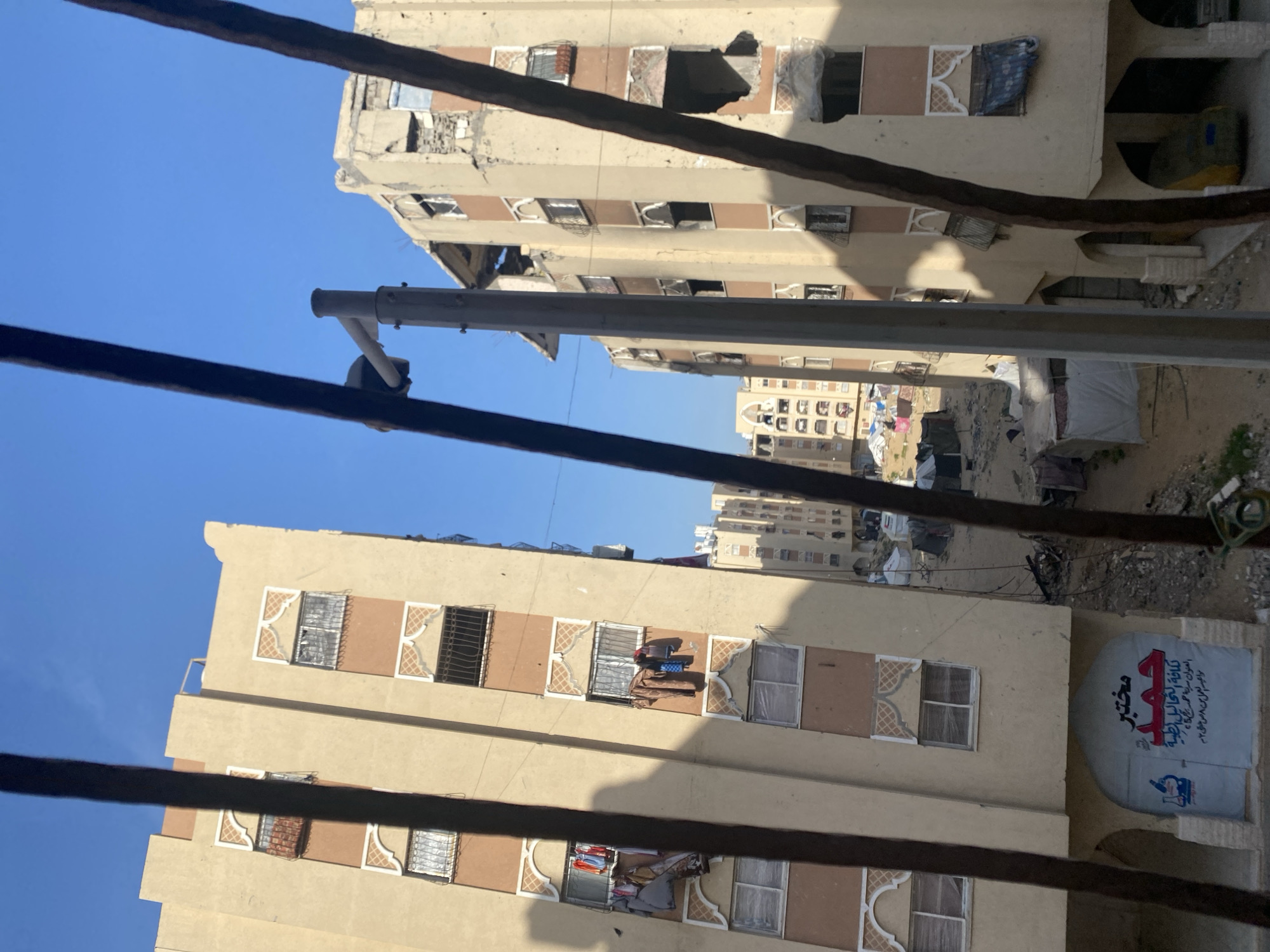 Urban architecture observed from interior viewpoint, multiple buildings documented