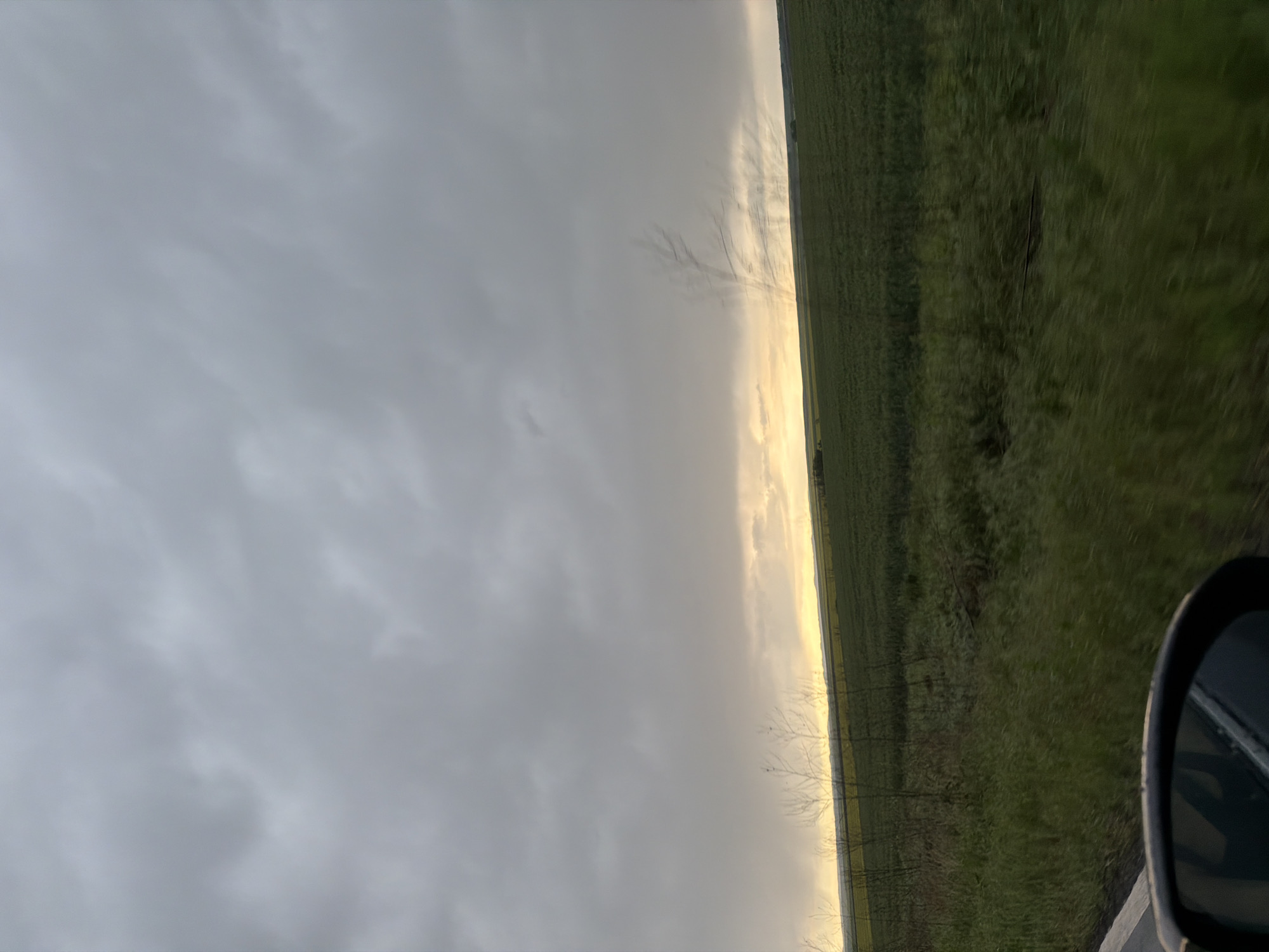 Driver captures rural Bulgarian landscape during afternoon journey
