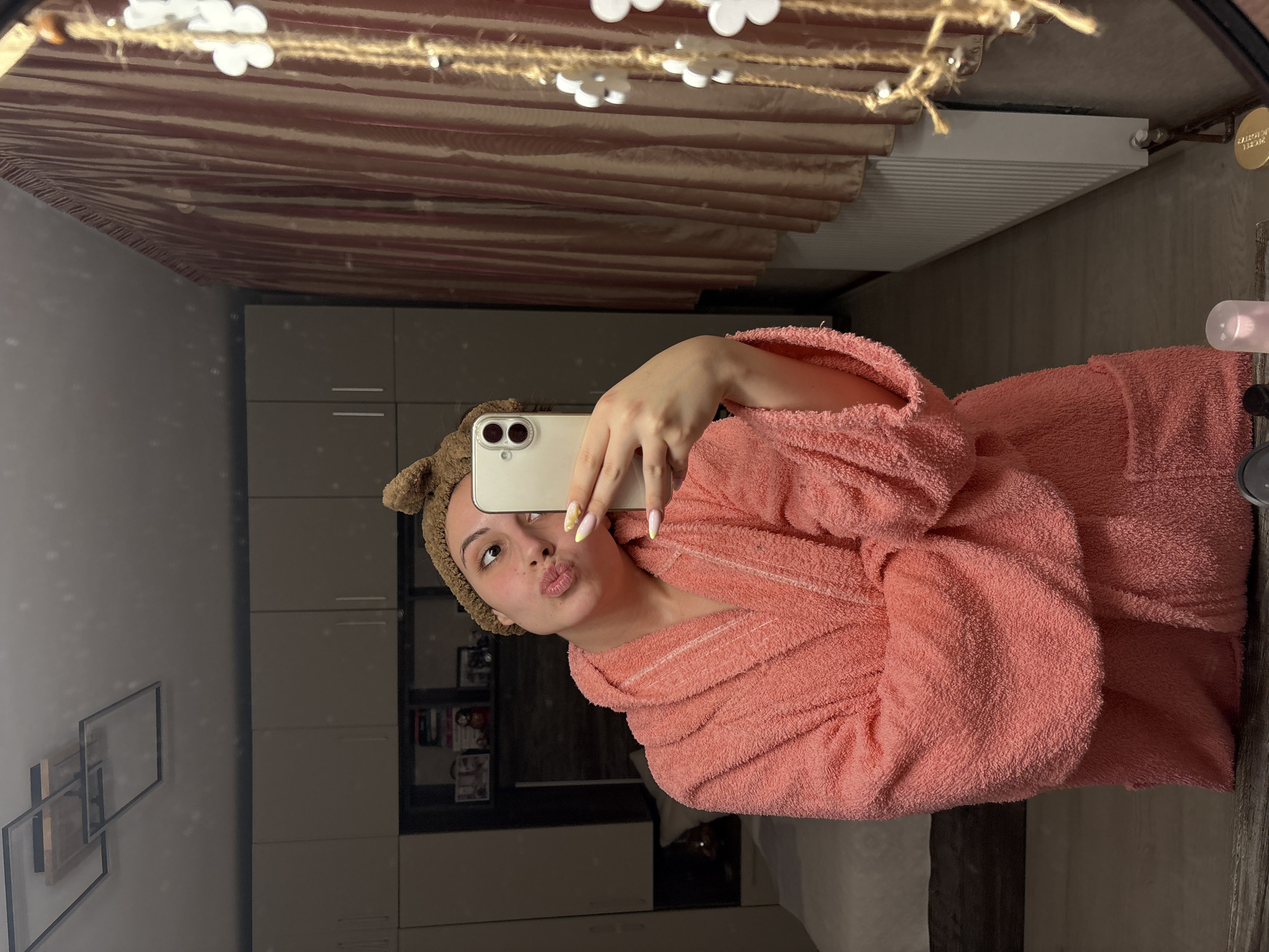 Woman Takes Bathroom Mirror Selfies in Animal Headband