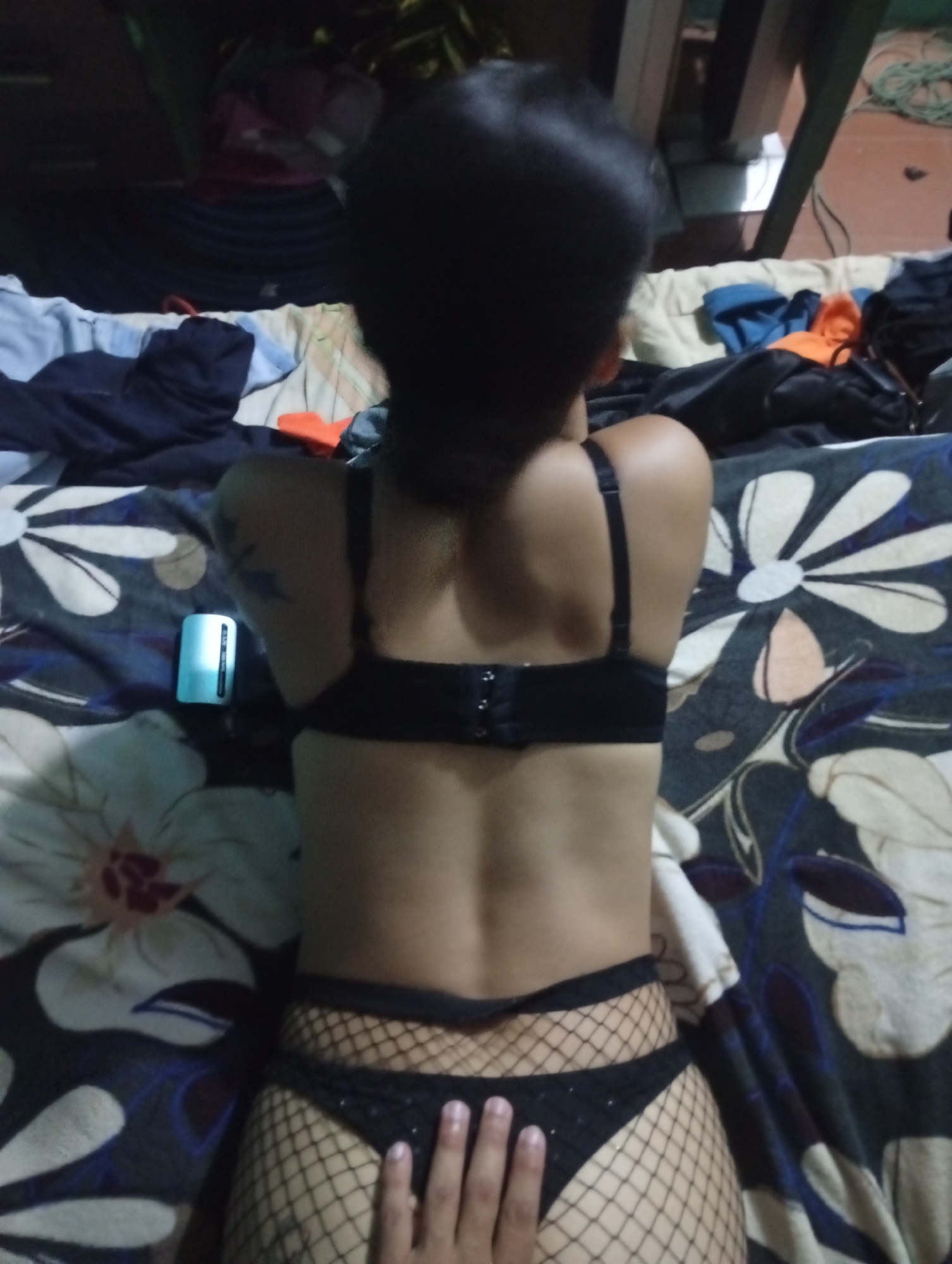 Person observed in bedroom setting in Altagracia, Venezuela
