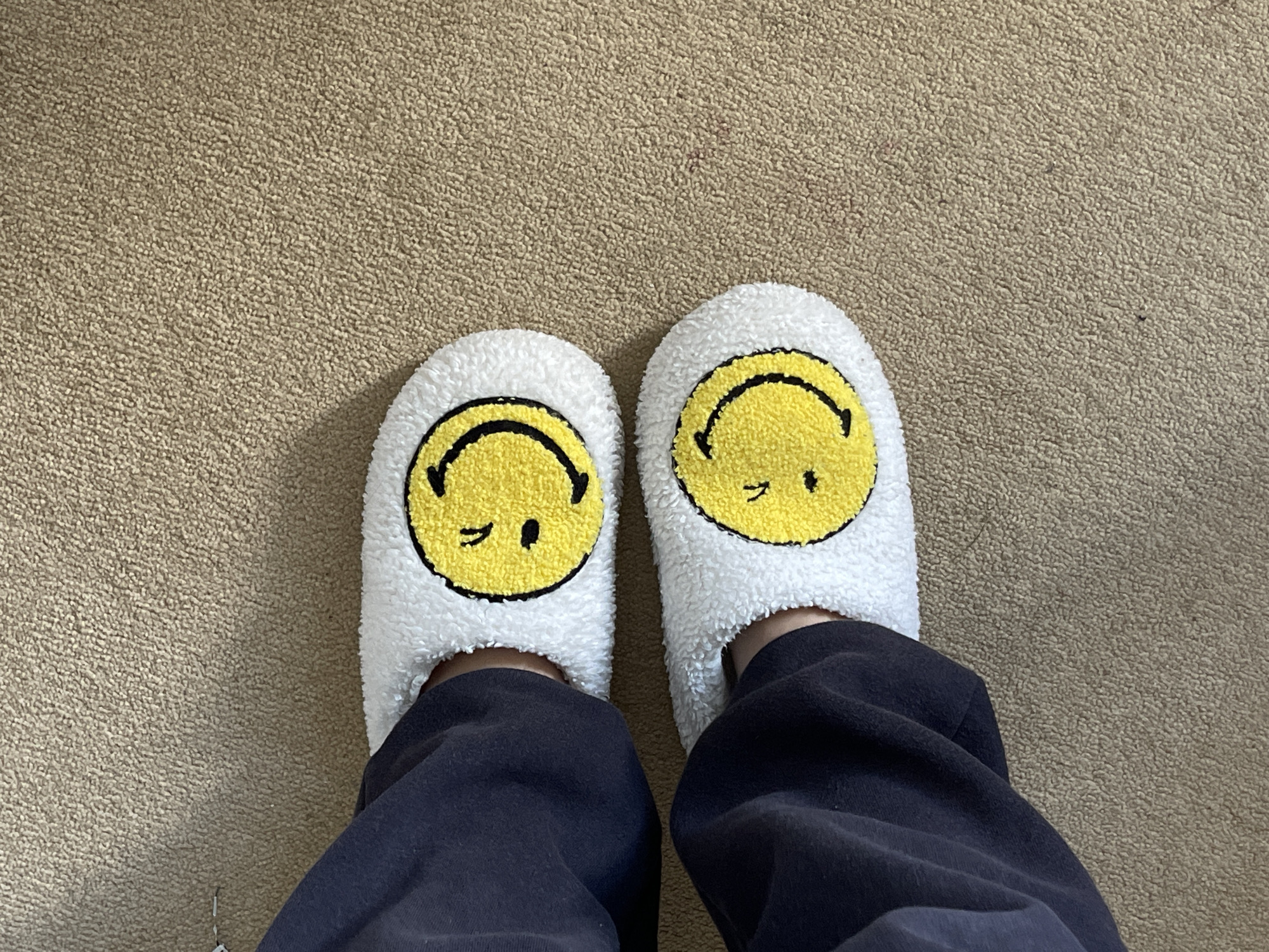 Person spotted wearing smiley face slippers in Maidstone home