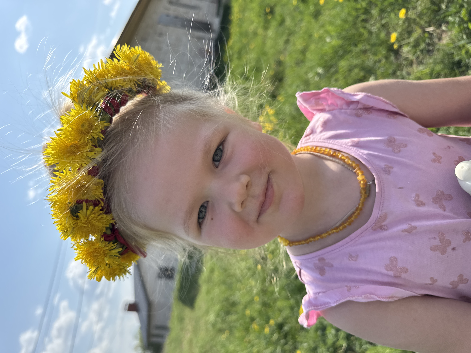 Spring day brings flower crowns and ice cream to Russian field