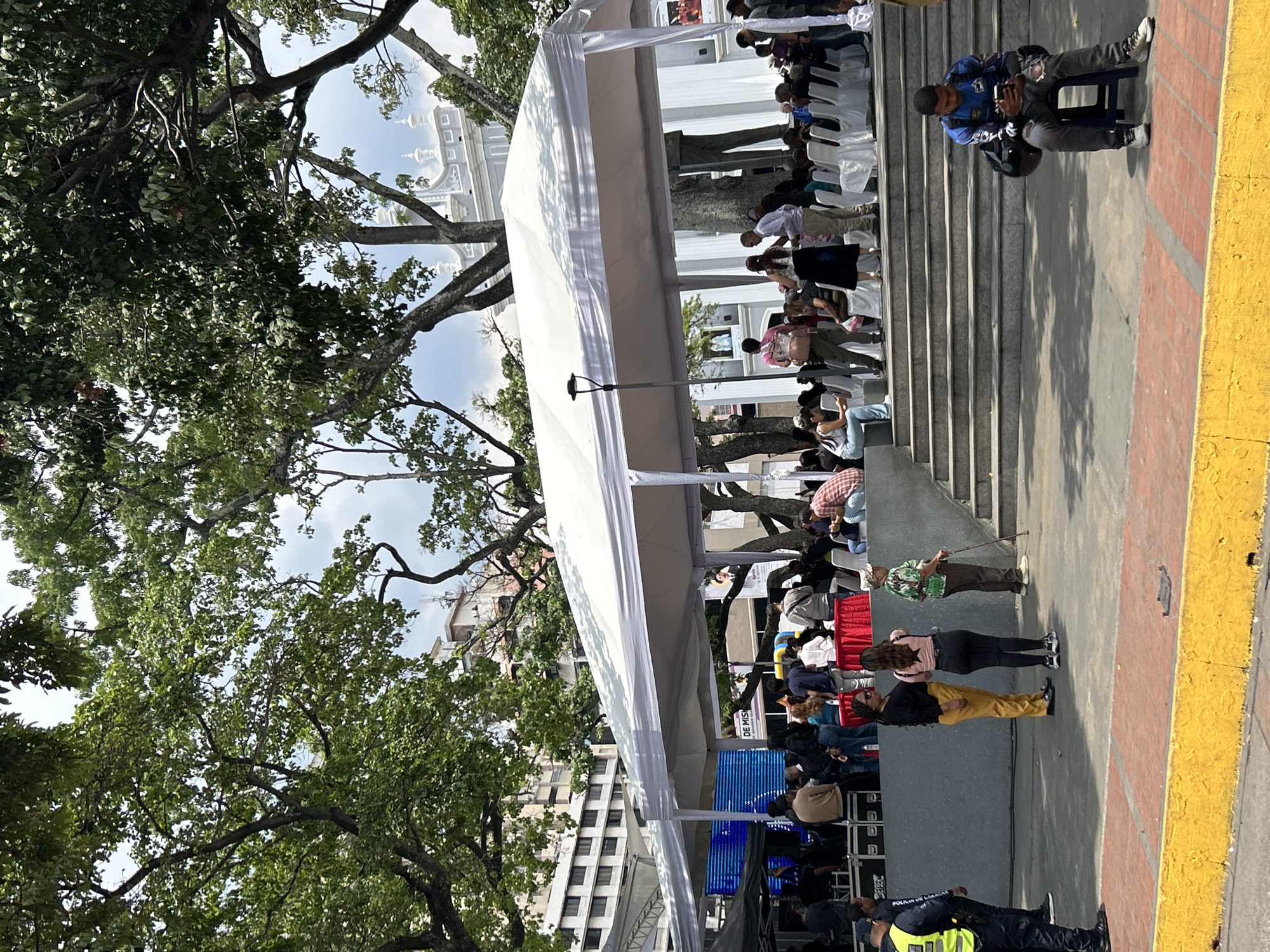 Public event under tents draws crowd in Caracas square
