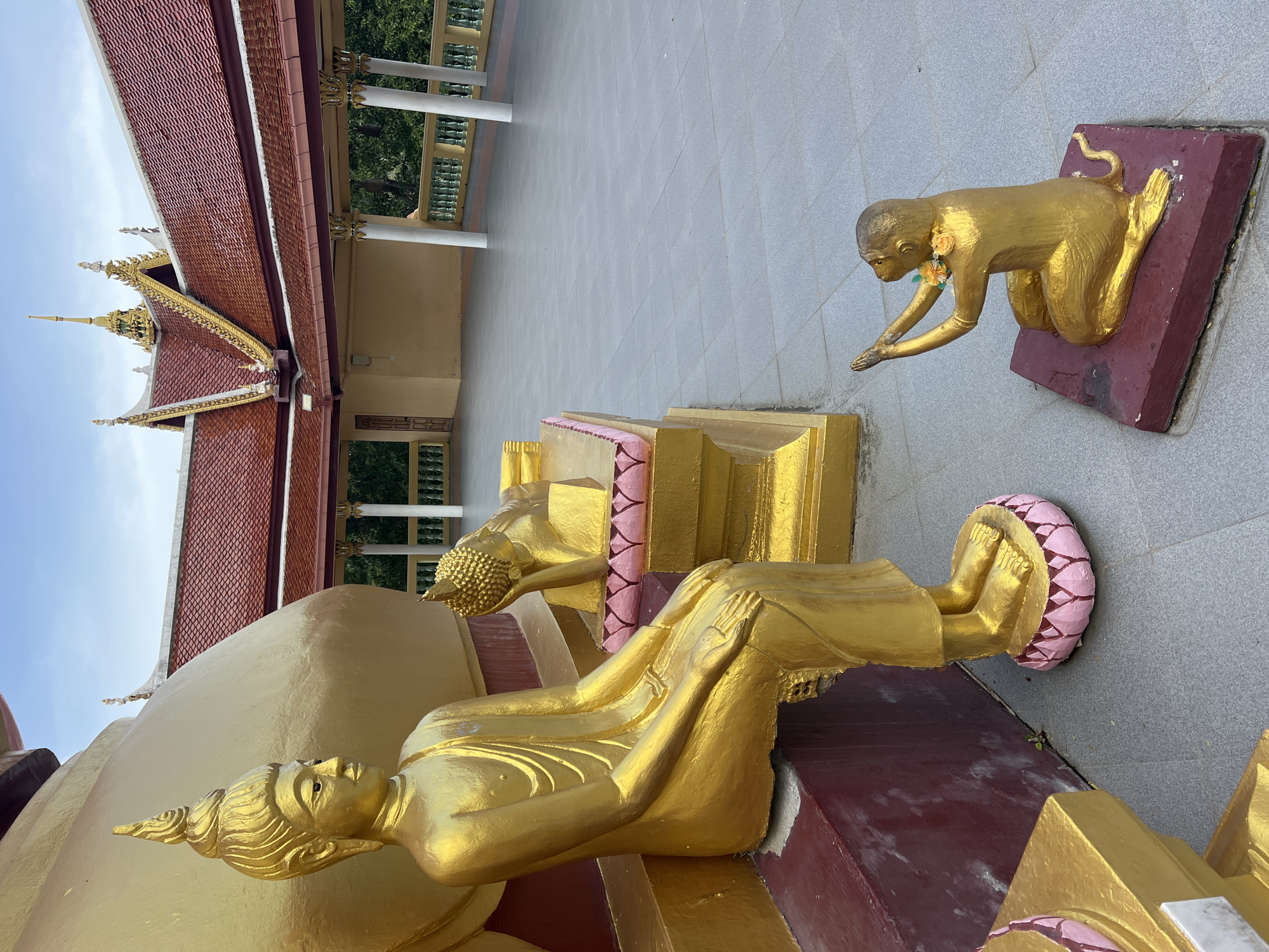 Golden Buddha statue at Ko Samui temple, multiple angles
