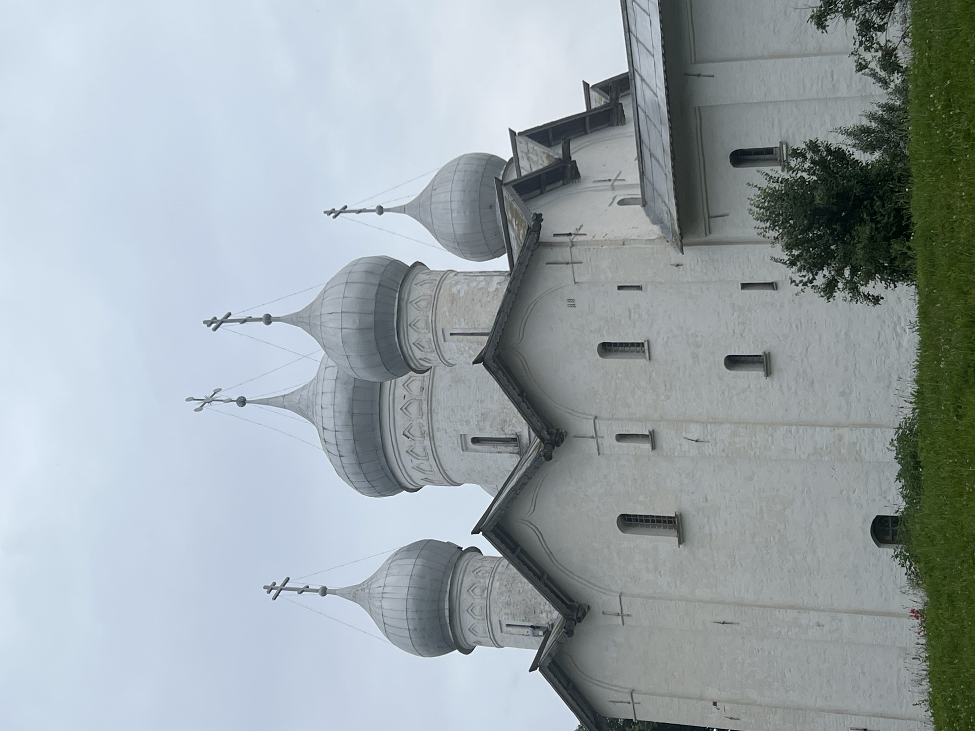 Monuments, medieval stonework, and summer flowers in Veliky Novgorod