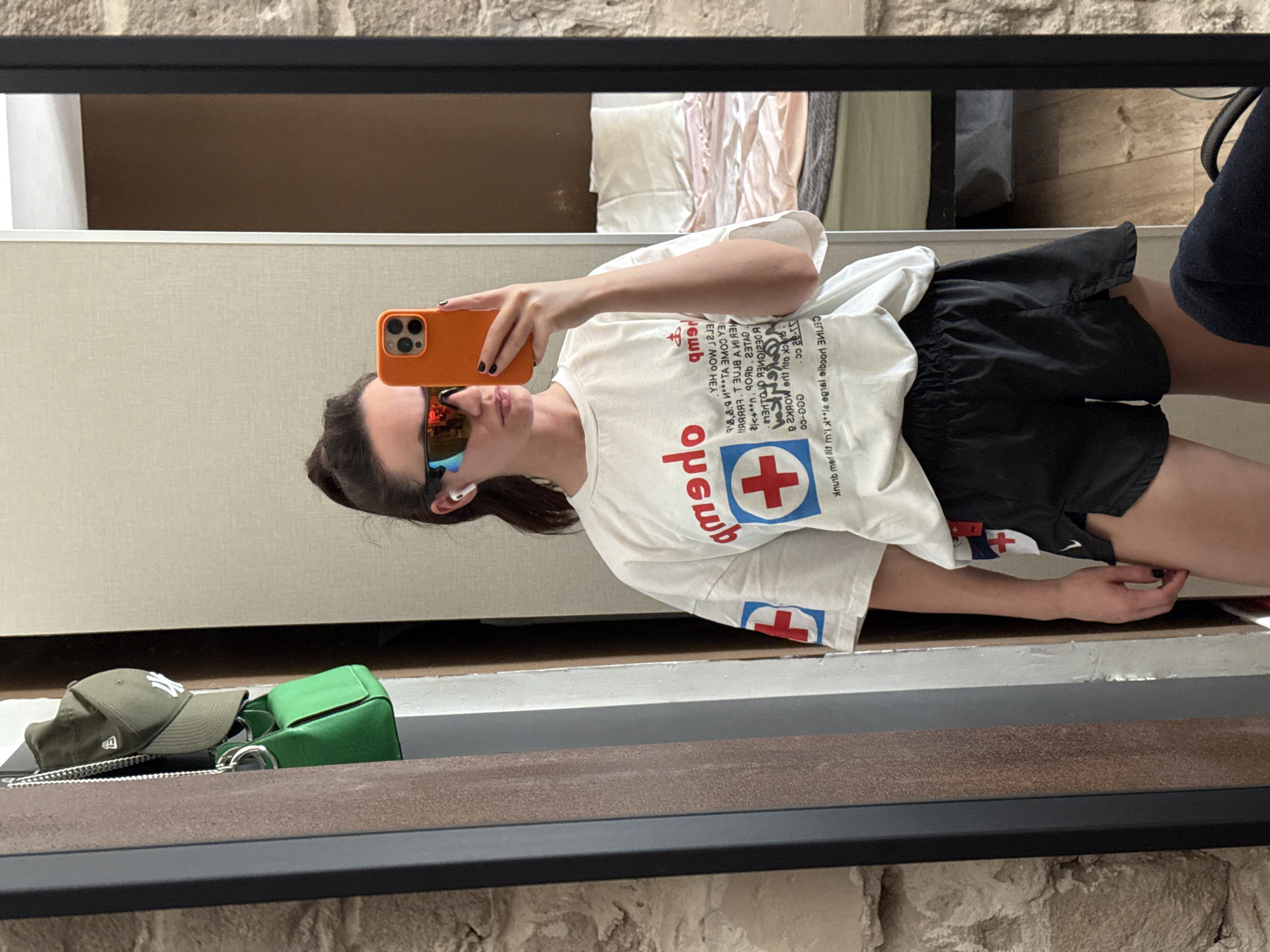 Woman takes mirror selfie in Tel Aviv