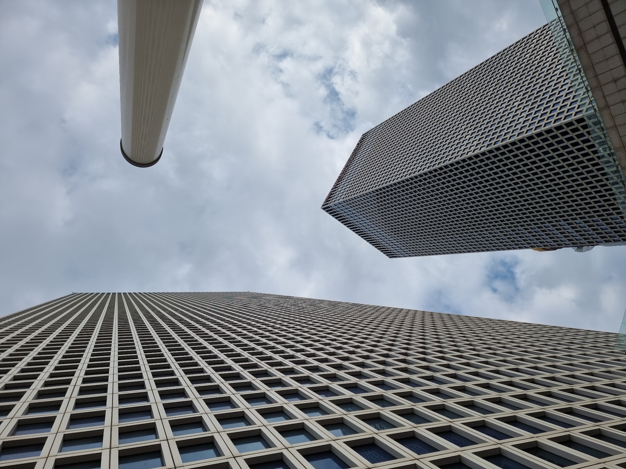 Architectural structures photographed against cloudy sky in Tel Aviv