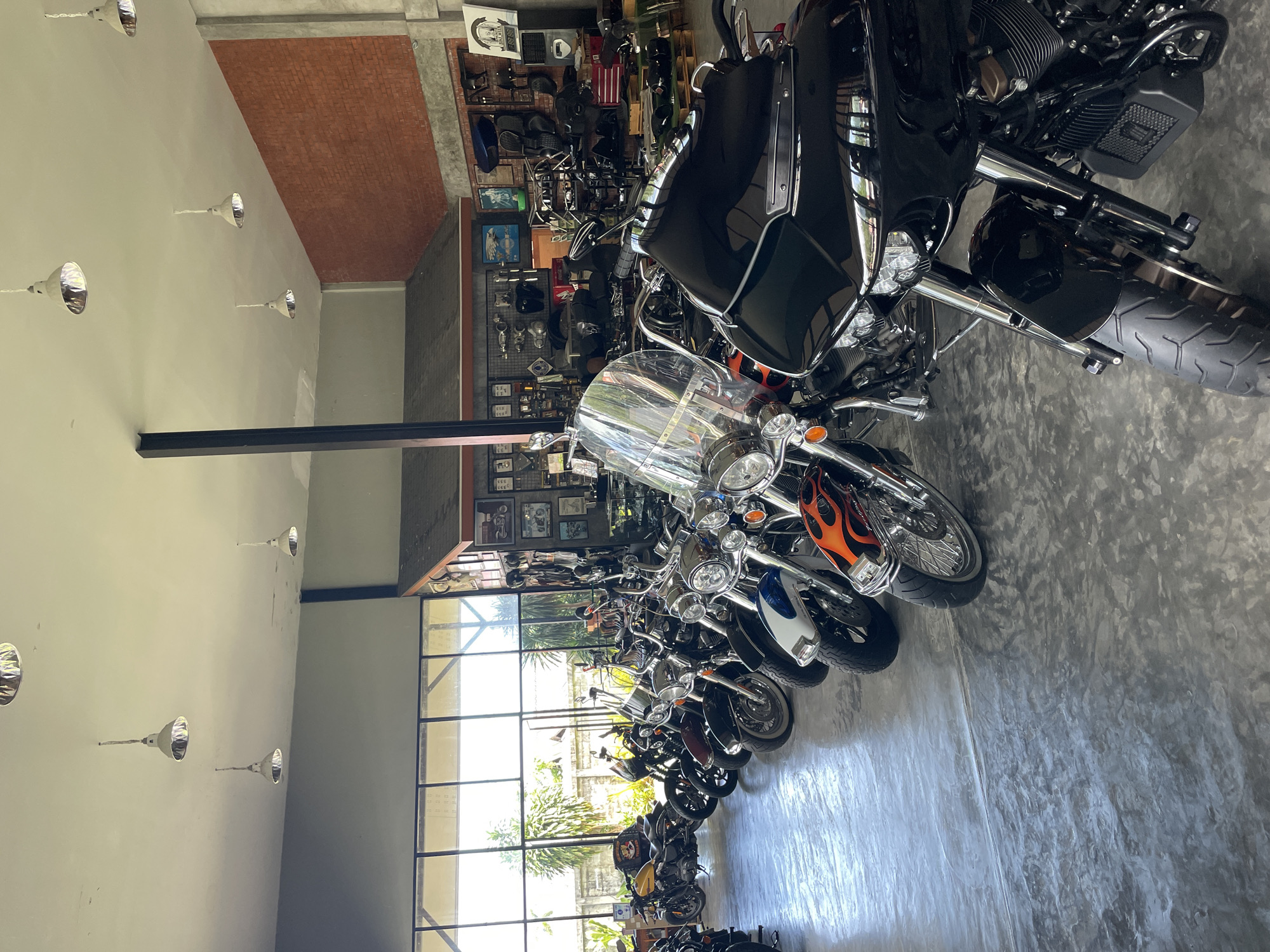 Motorcycle dealership showroom documented in Ban Yid, Thailand