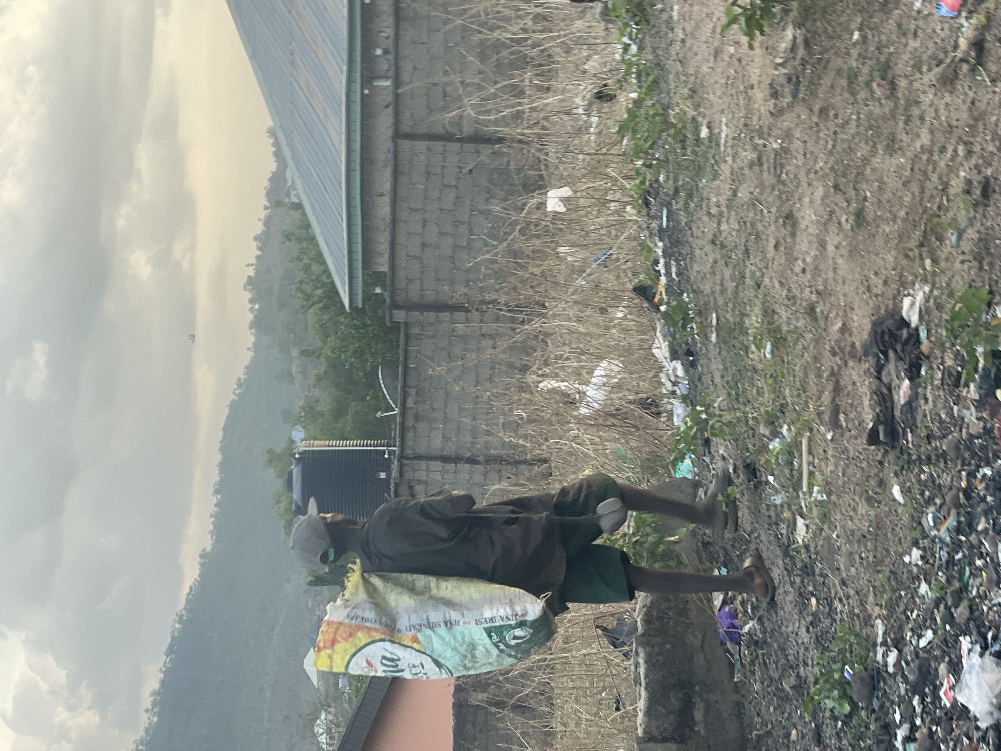 Daily life scenes documented across Lokoja during sunny afternoon