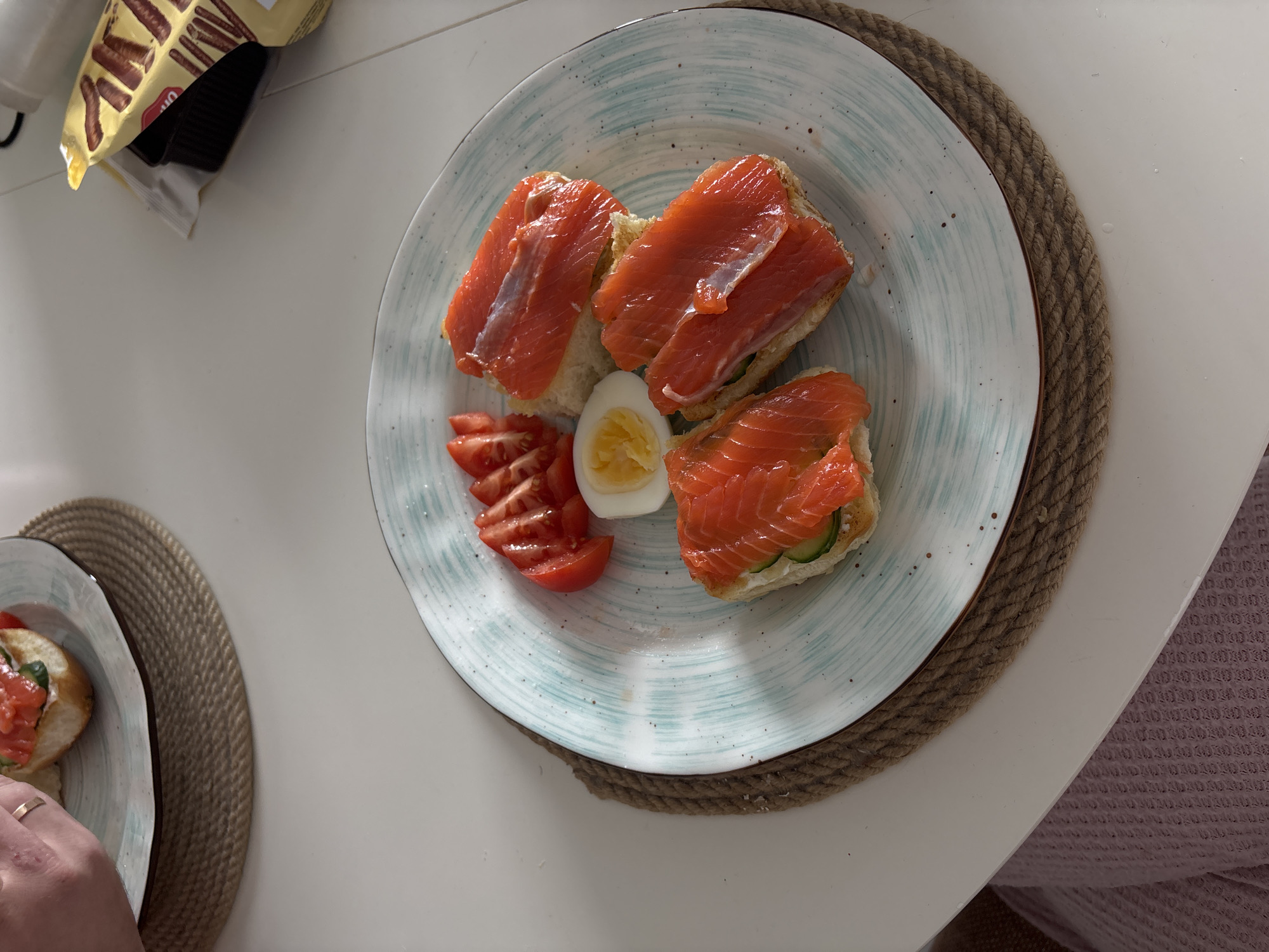 Salmon sandwiches photographed in triangular arrangement in Krasnoyarsk