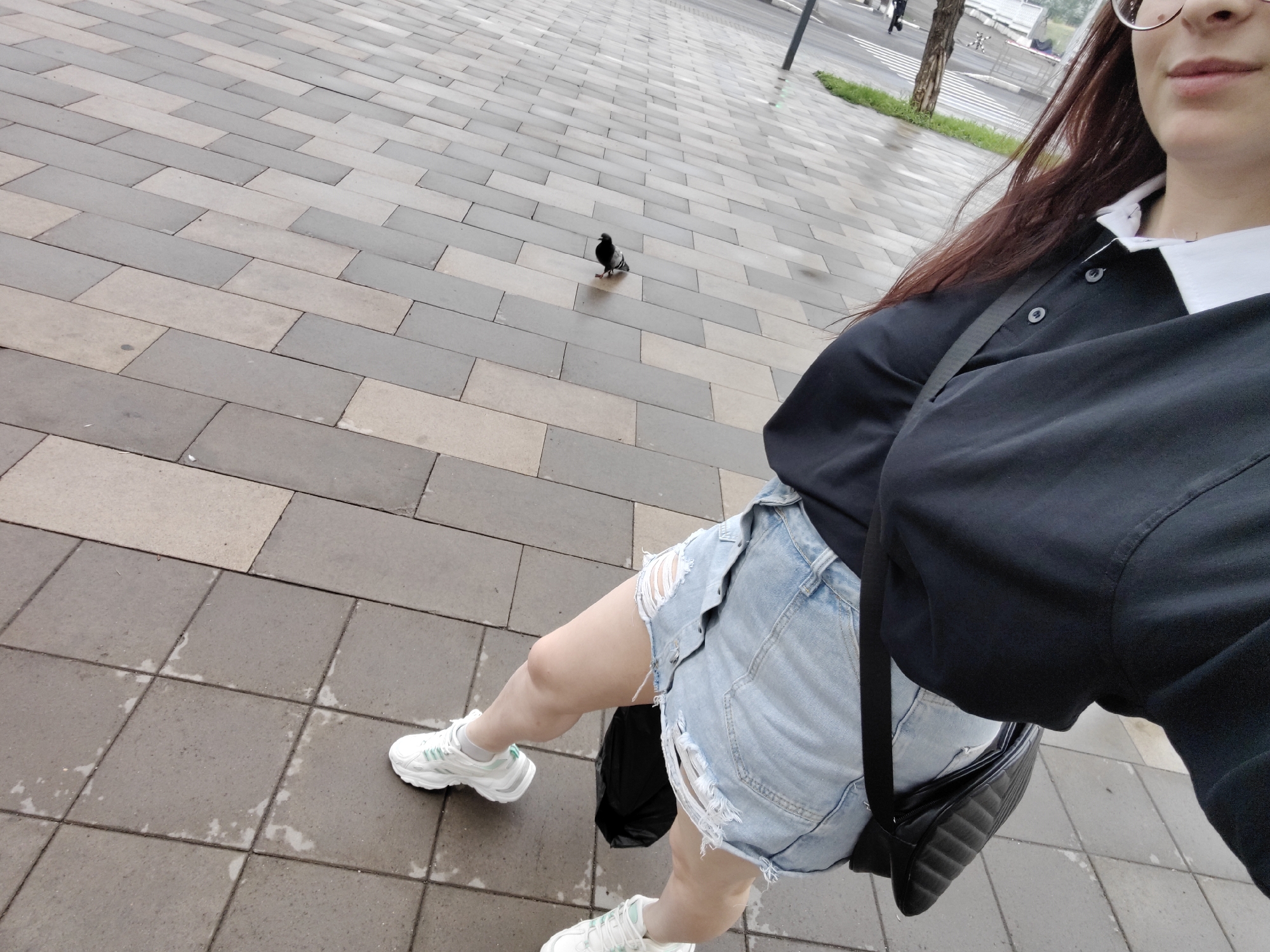 Quick selfie stop on rain-wet Krasnoyarsk pavement