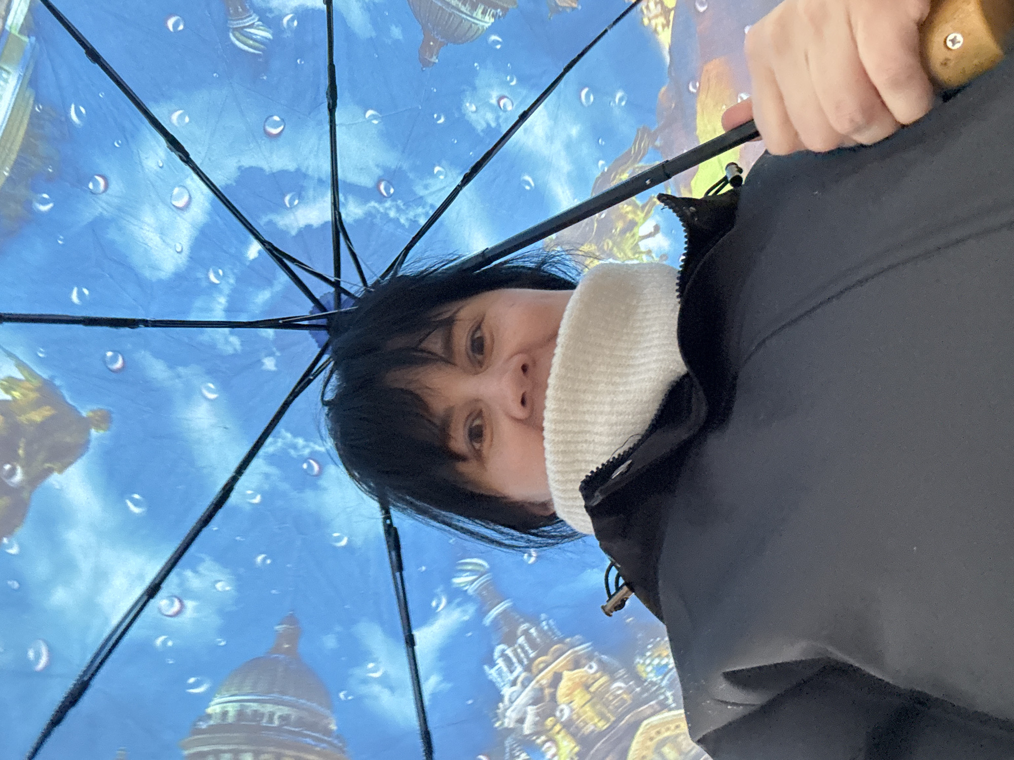 Woman with decorative umbrella spotted in Zav'yalovo, Russia