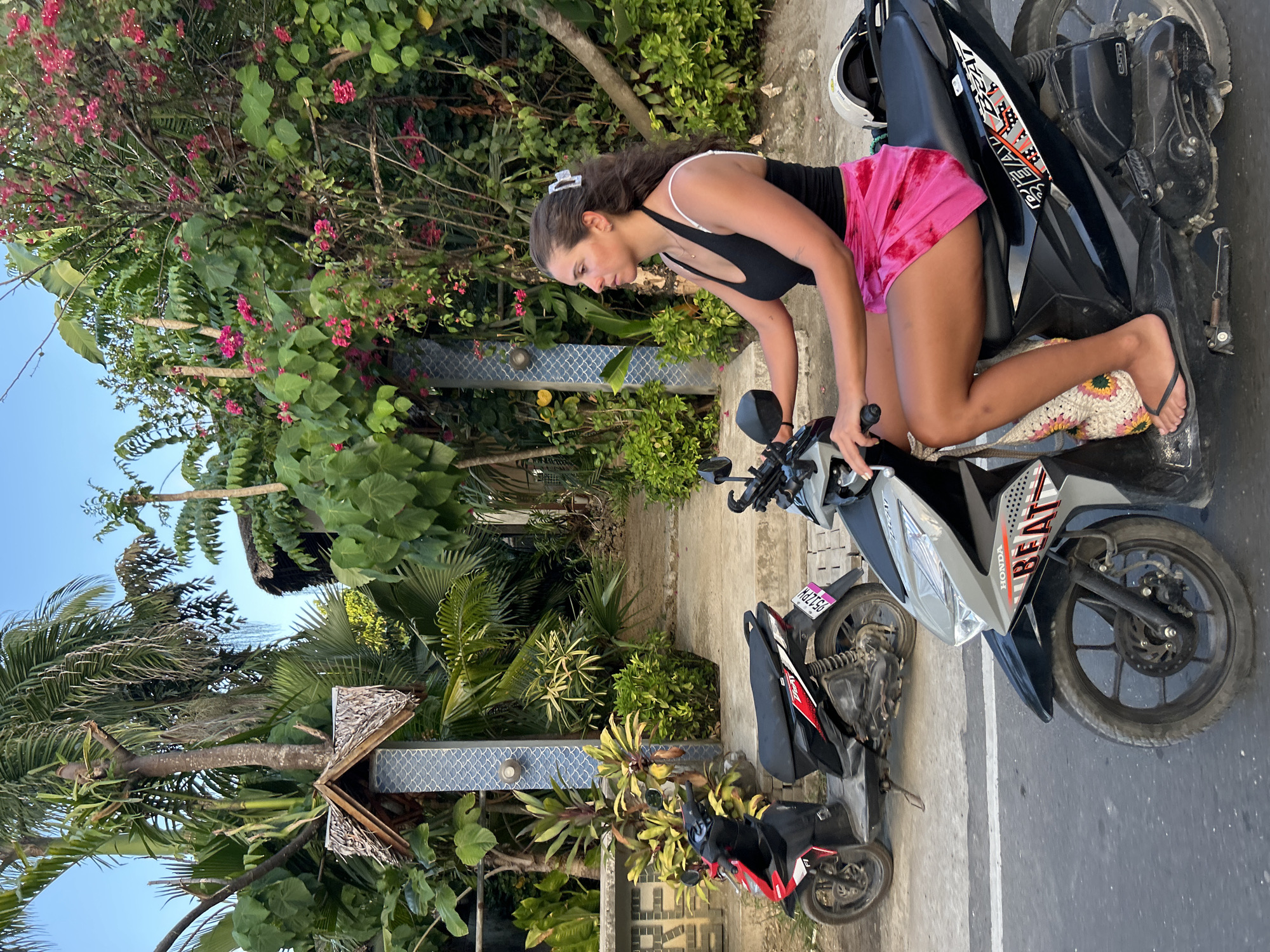 Woman spotted riding scooter in General Luna, Philippines