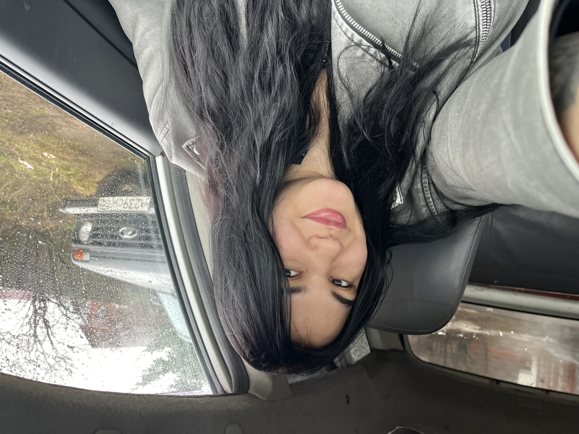 Woman and child captured during rainy night in Chaikovsky