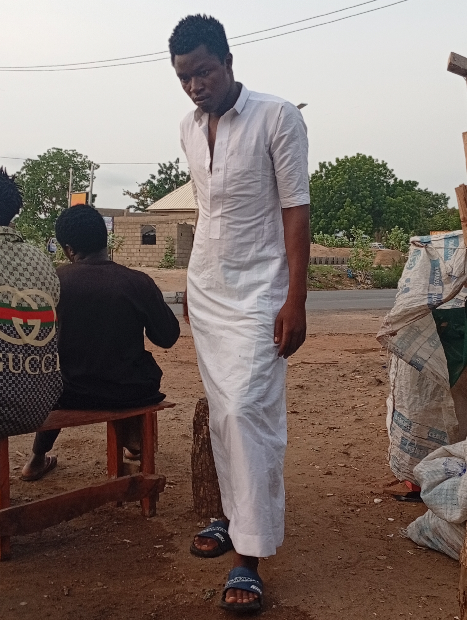 Early morning street life documented in Adankolo, Nigeria