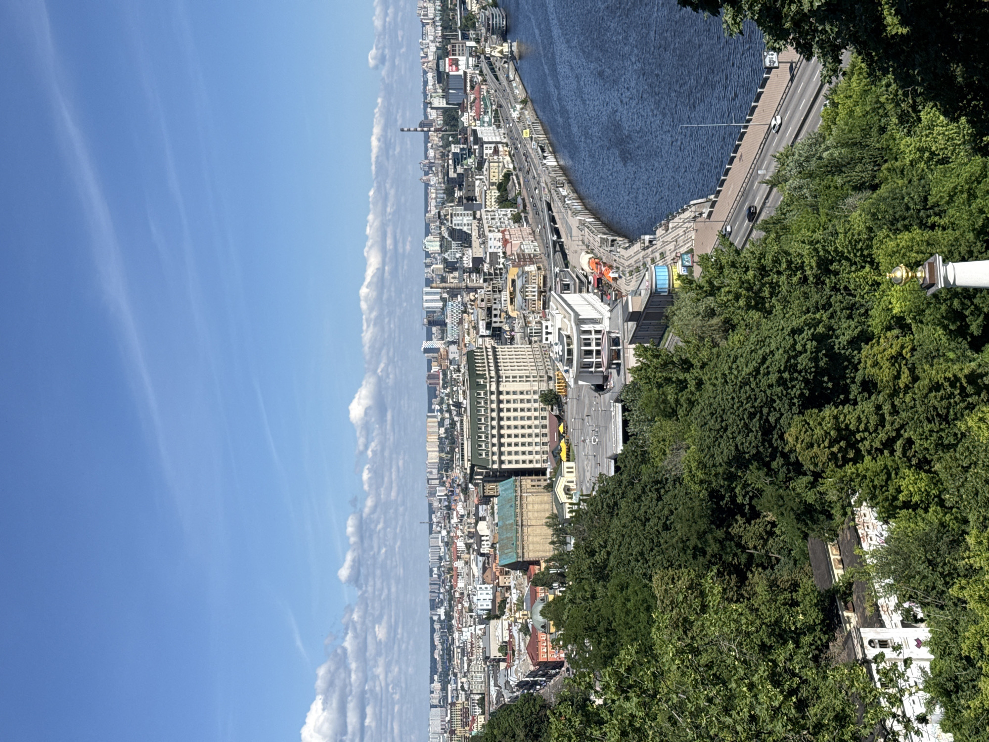 Kyiv landmarks, war memorials, and riverside views on a sunny morning