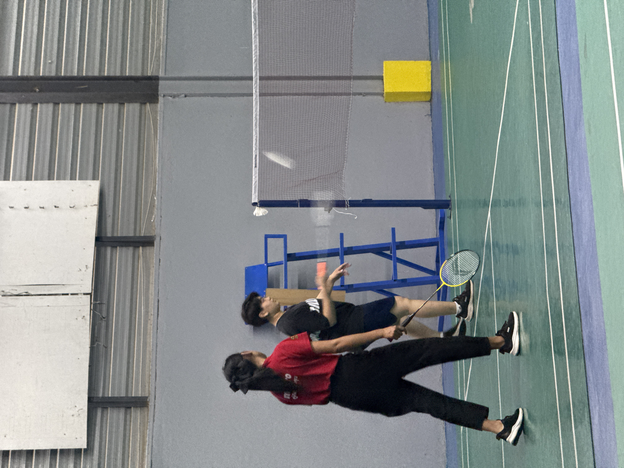 Badminton session at an indoor court in Ko Samui