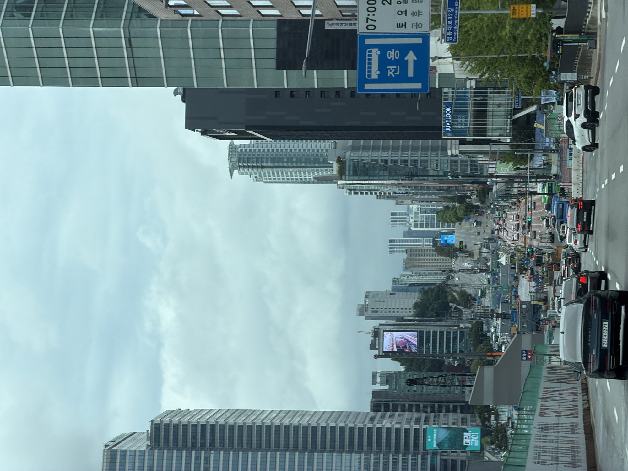 Glass towers and wide streets on a cloudy Seoul morning