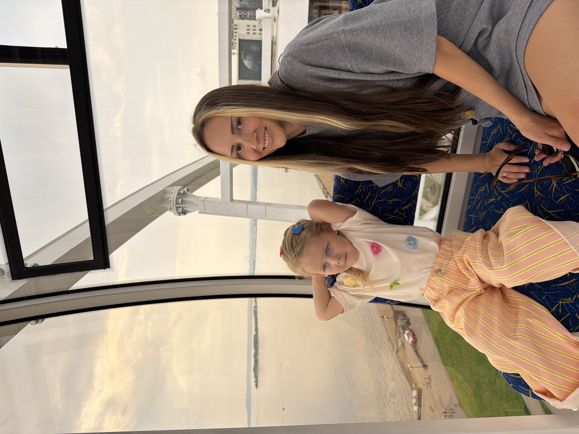Woman and child enjoy Ferris wheel ride in Saratov