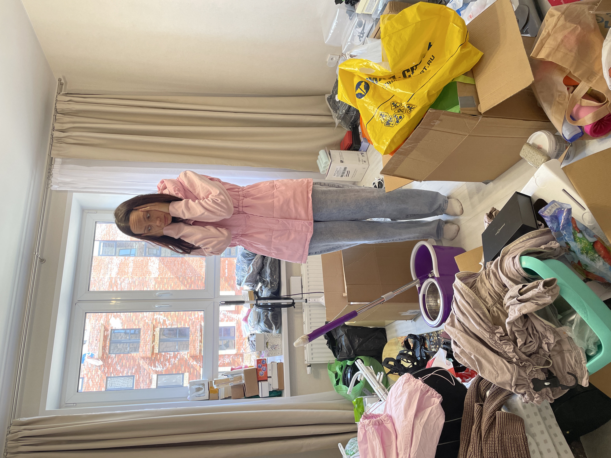 Woman finds comfort with cat in Izhevsk home