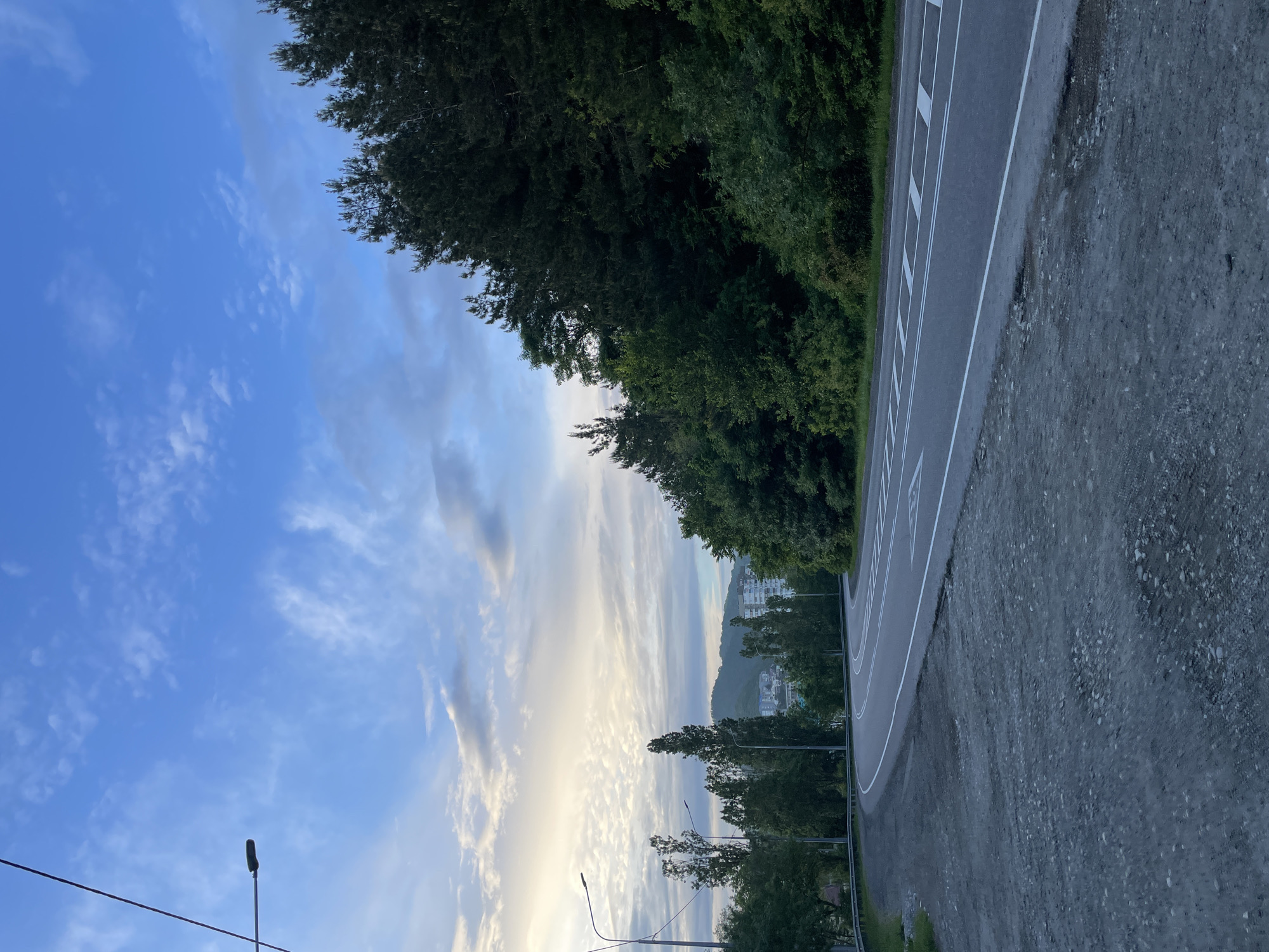 Daily life documented across Olginka's roads, paths, and coastline