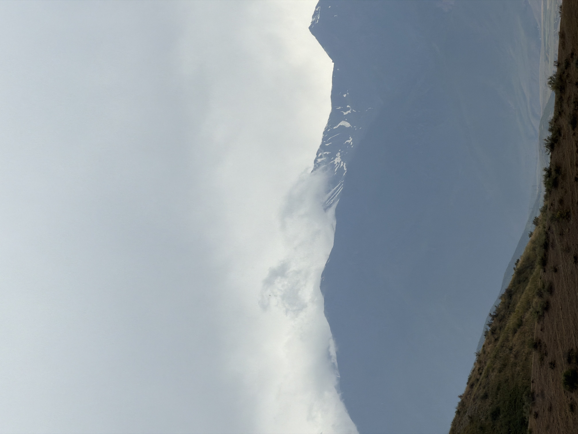 Hiking and exploring a remote snow-capped mountain range
