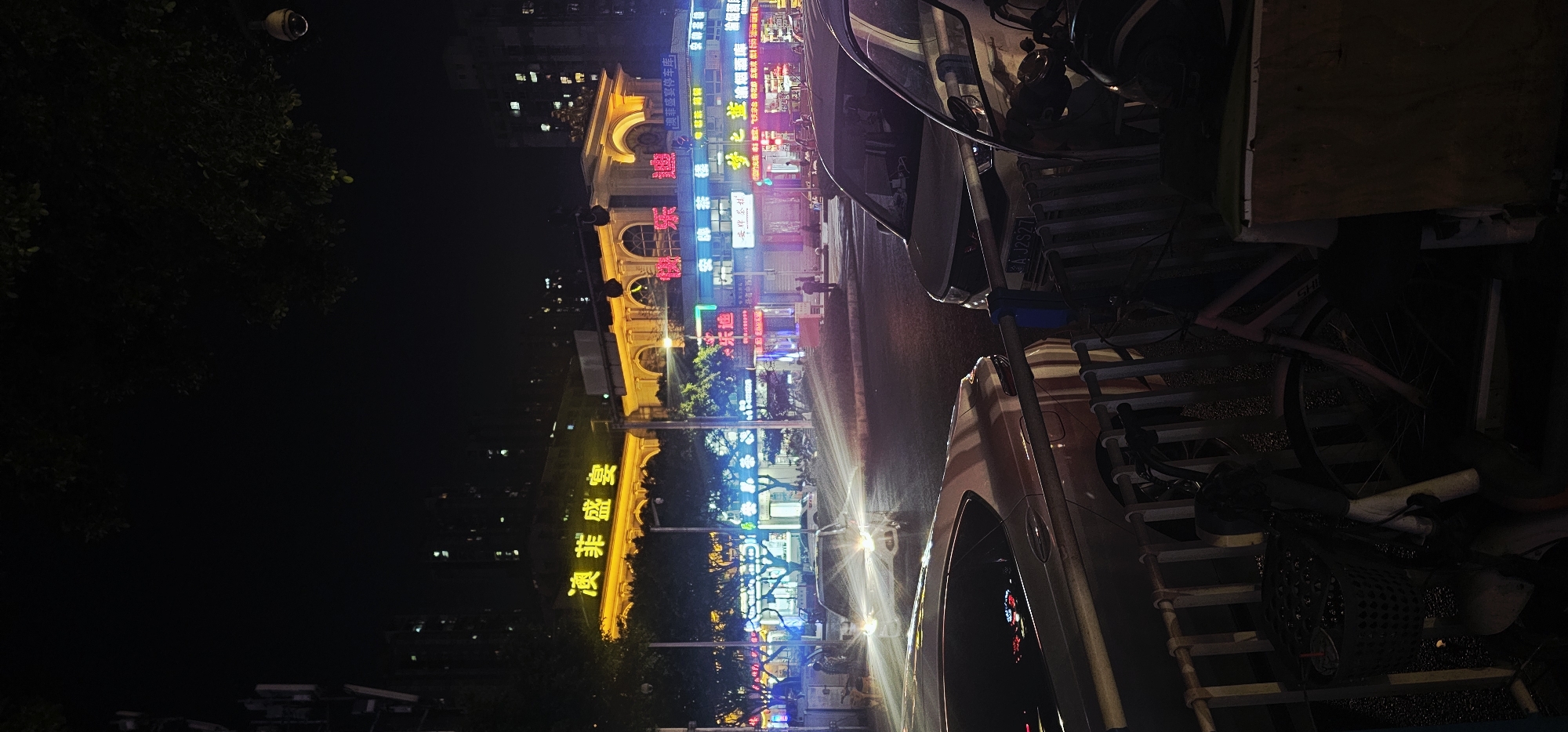Vibrant nighttime street activity captured in Liangjiang, China