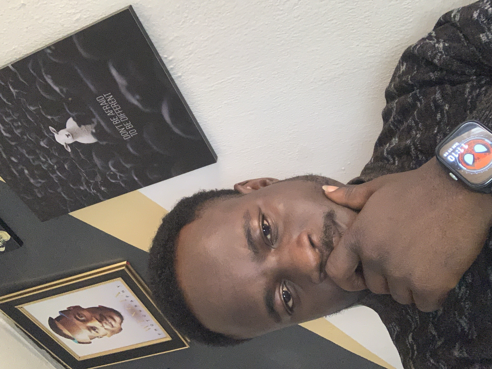 Mirror selfie session in a Jos, Nigeria indoor space