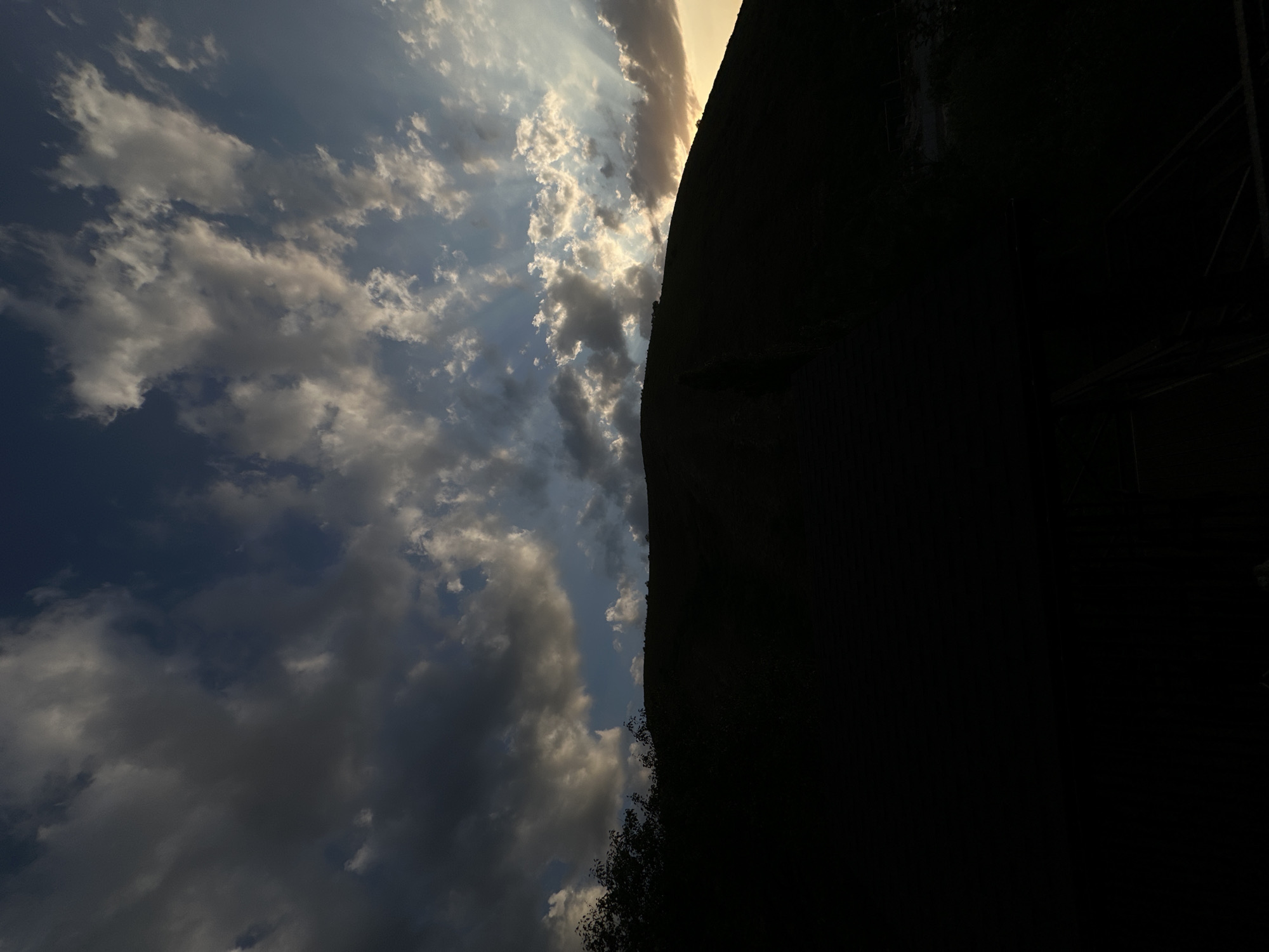 Hillside park visit in Almaty under a dramatic evening sky