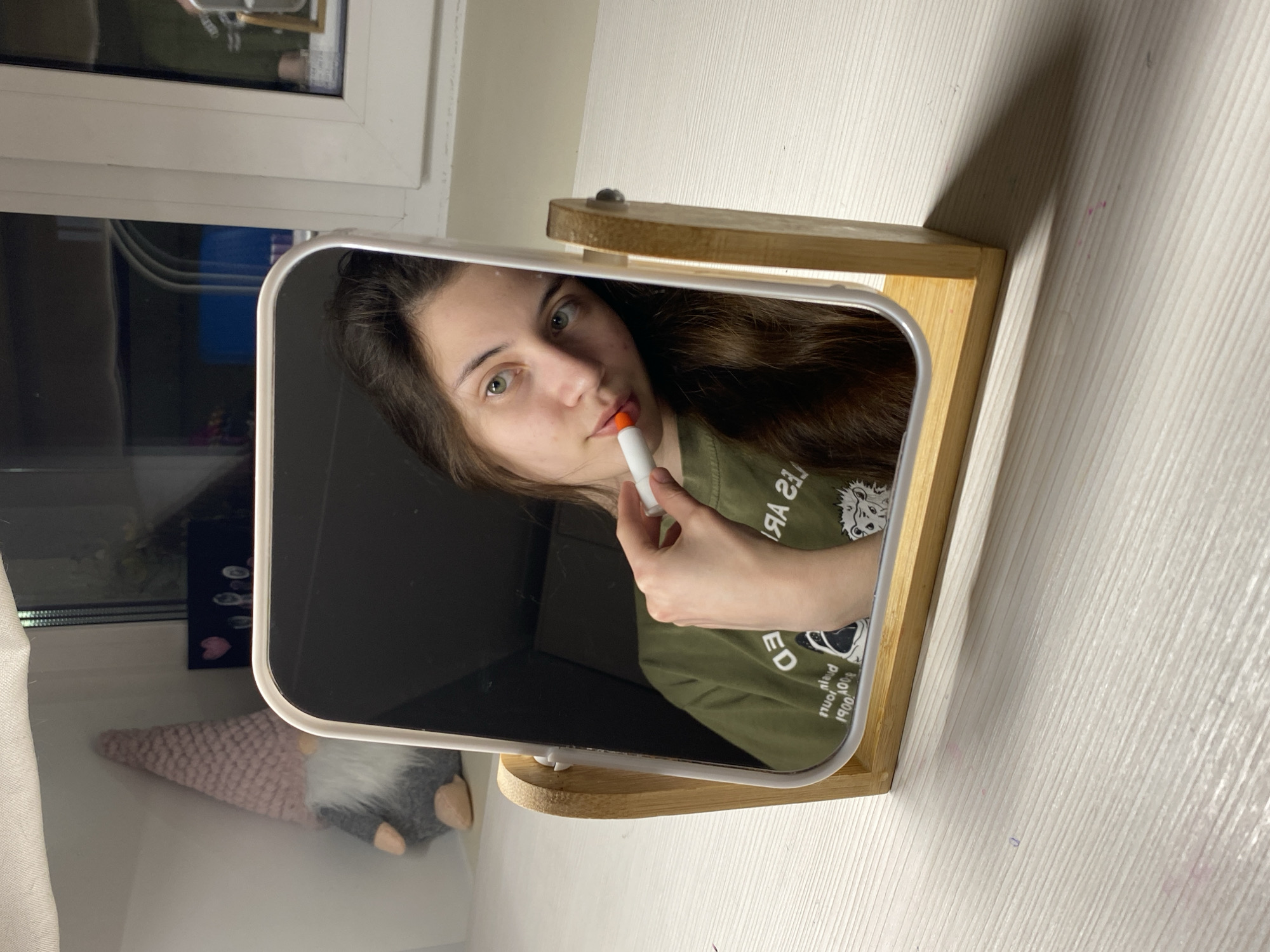 Woman's casual moments captured in mirrors during Votkinsk evening