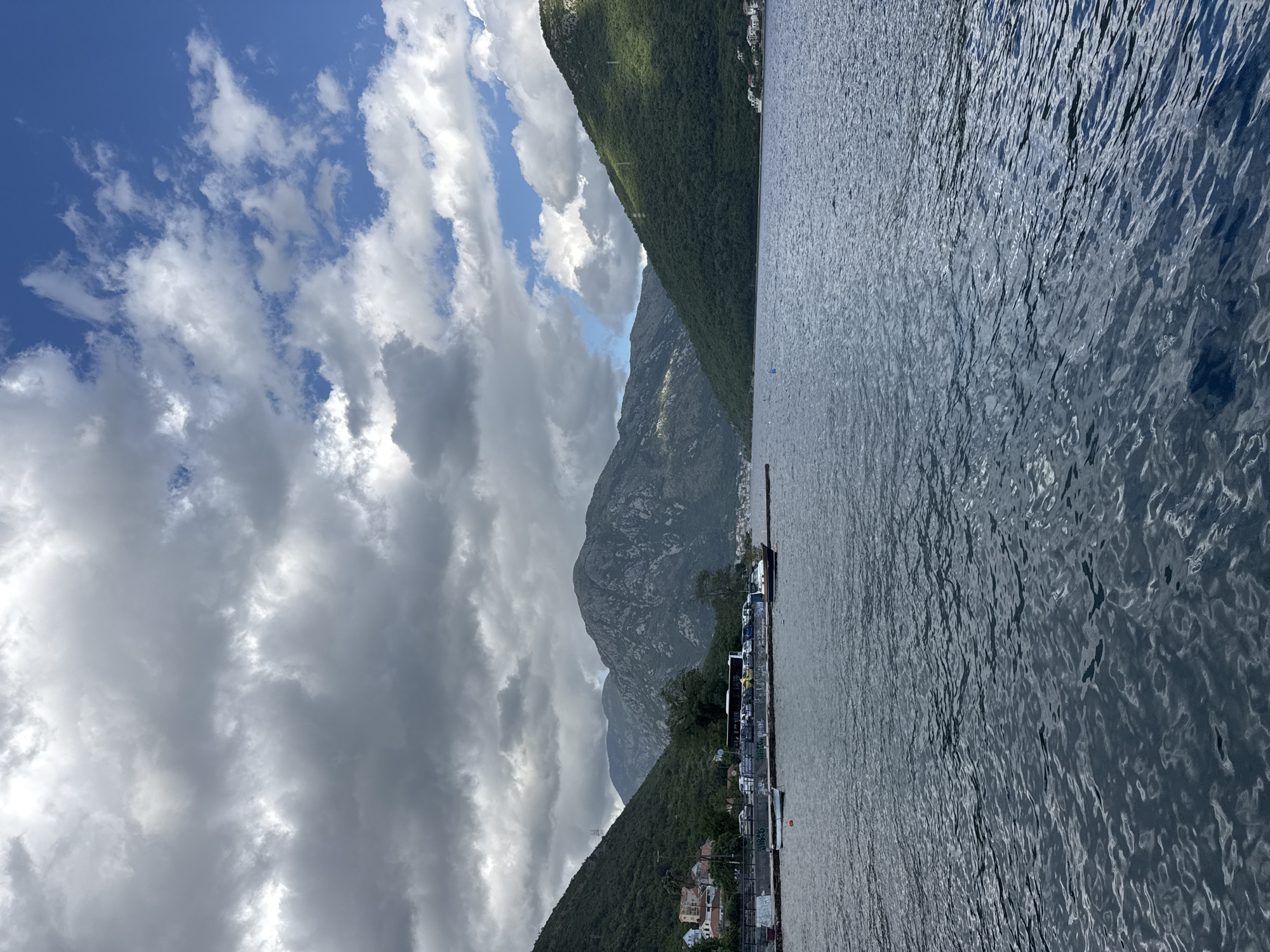 Boats docked at pier in Montenegro waterscape observed