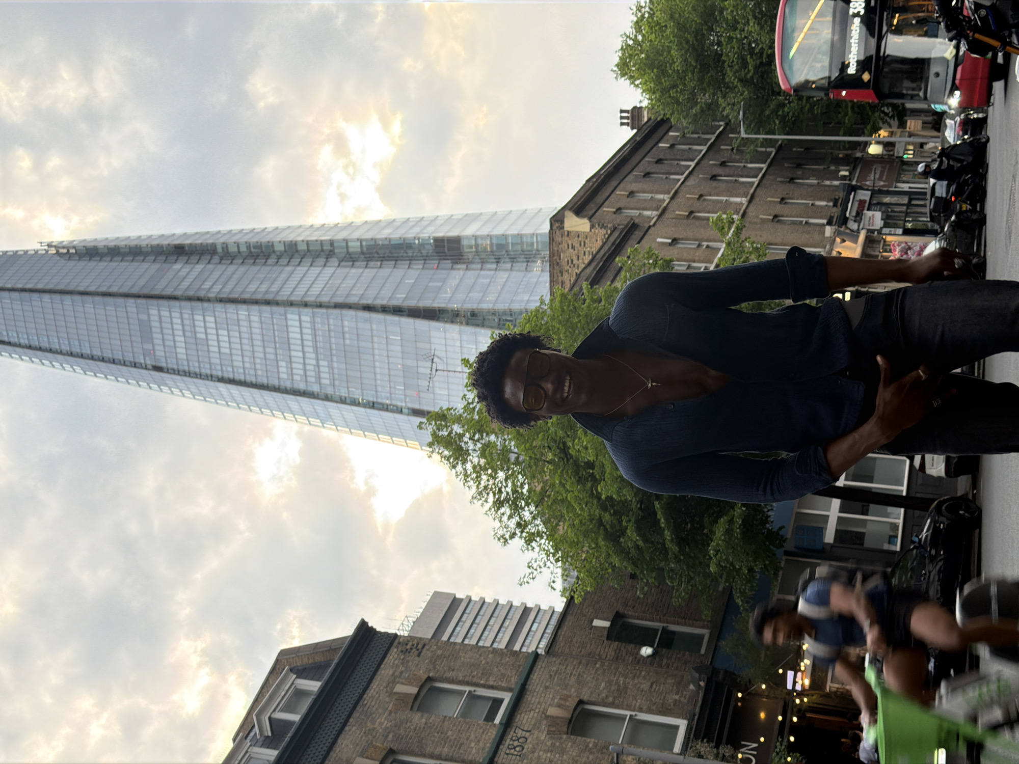 Person photographed amid busy London street scene
