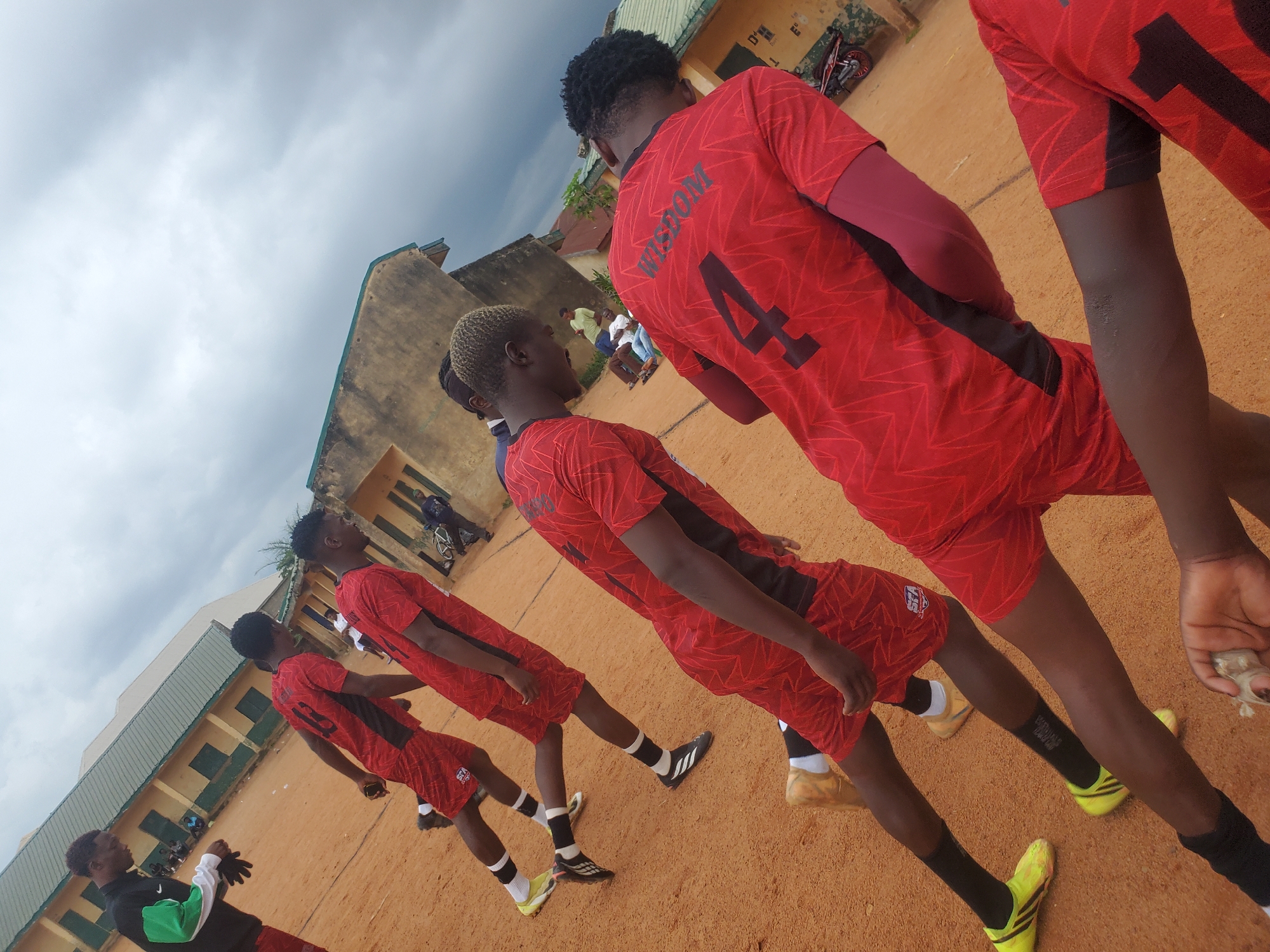 Activity on a dusty school field in Jos, Nigeria