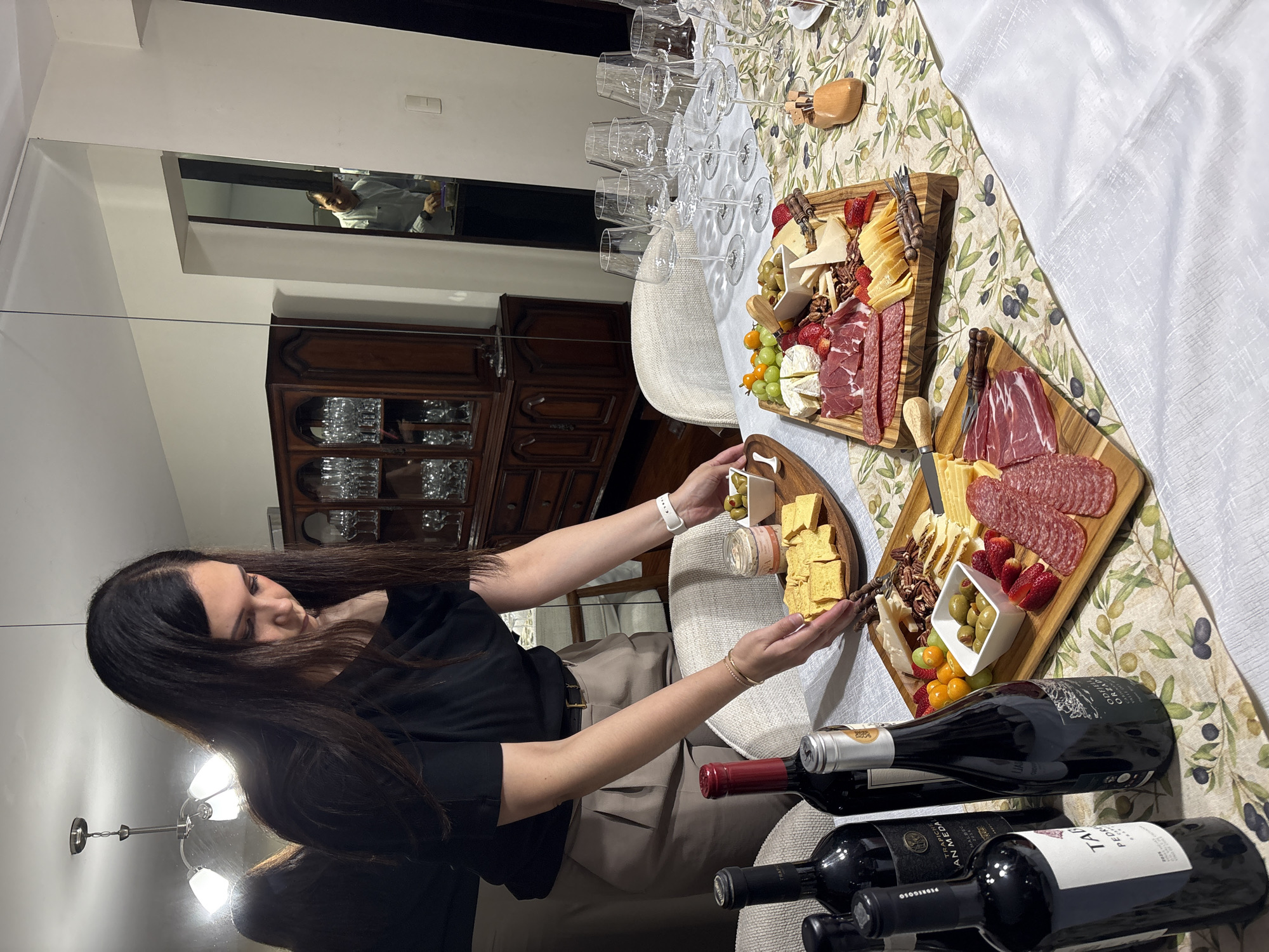 Late-night charcuterie gathering documented in San Isidro, Peru