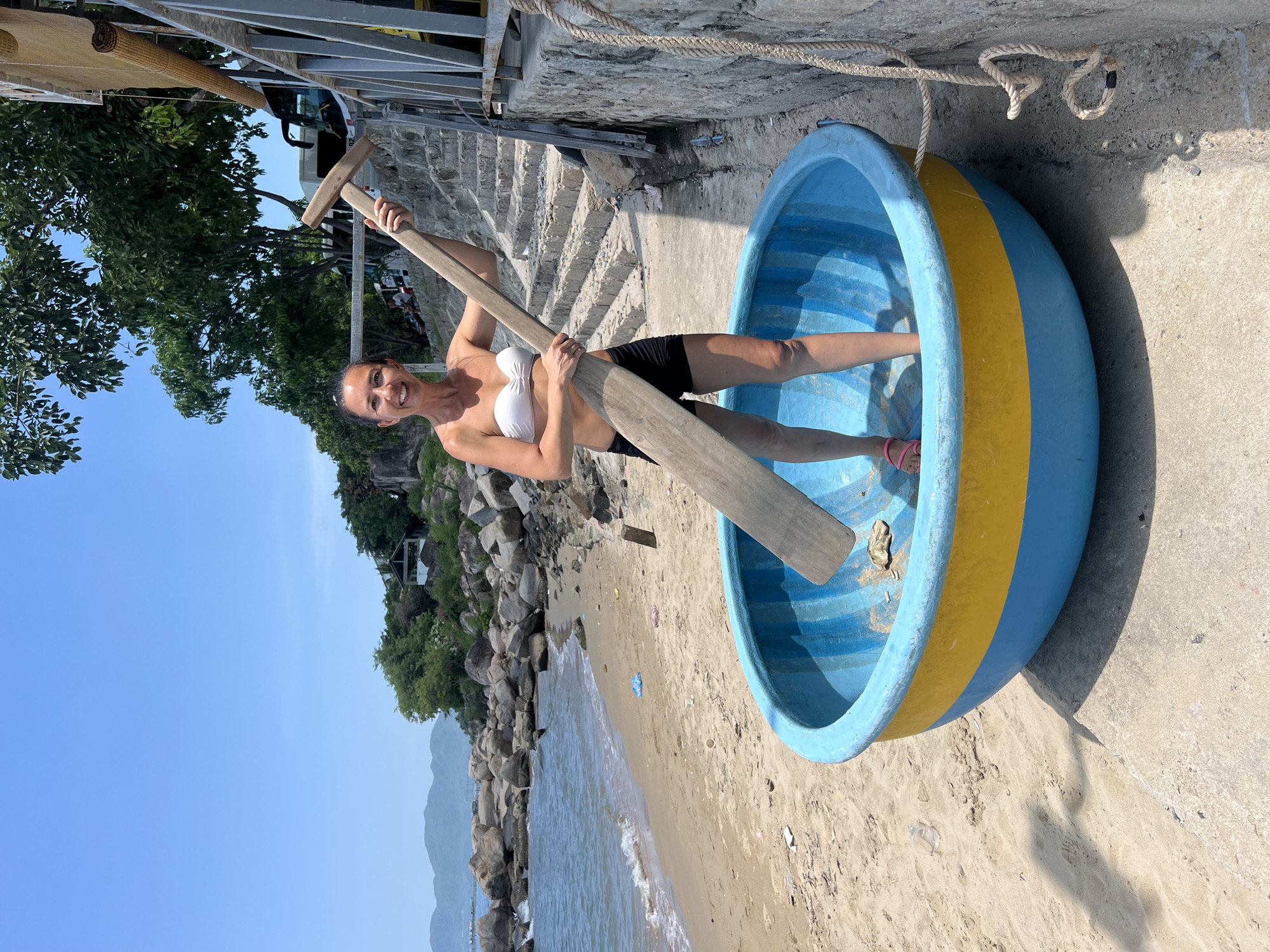 Nha Trang coastline: boats, boulders, and a big banyan tree