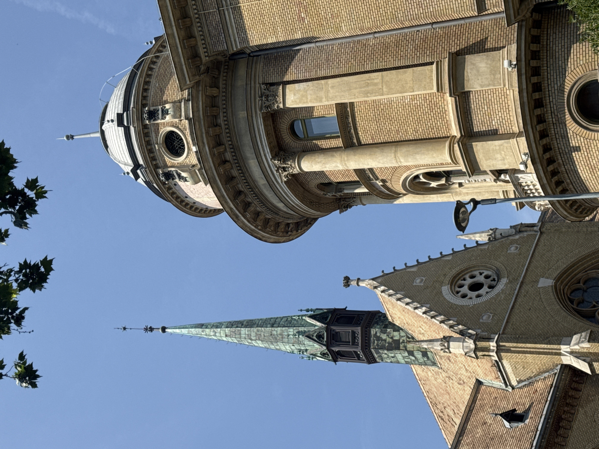 Budapest street-level architecture and a Mercury statue