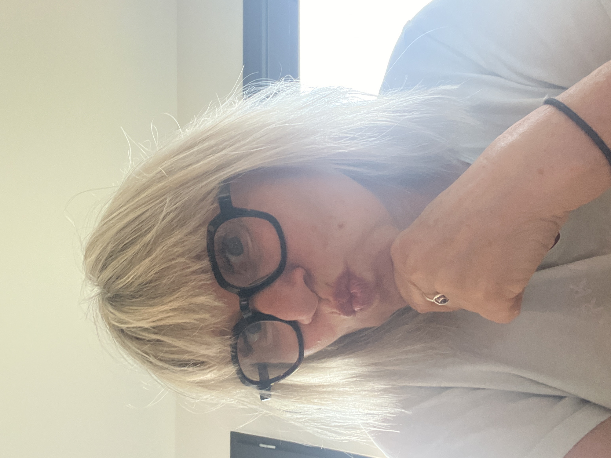 Portrait of blonde person with glasses captured in Chambœuf
