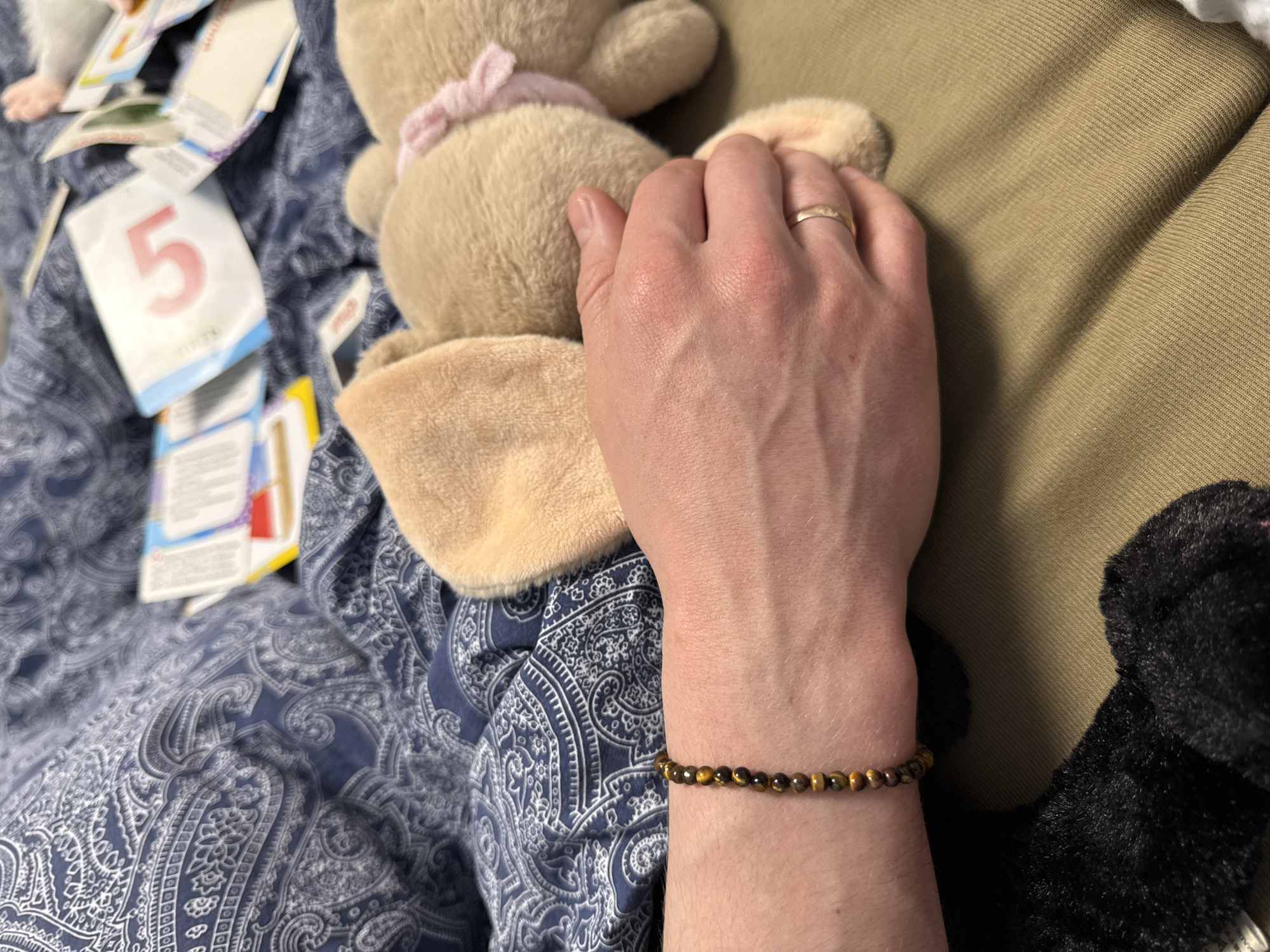 Parent and baby share quiet playtime moment in Moscow home