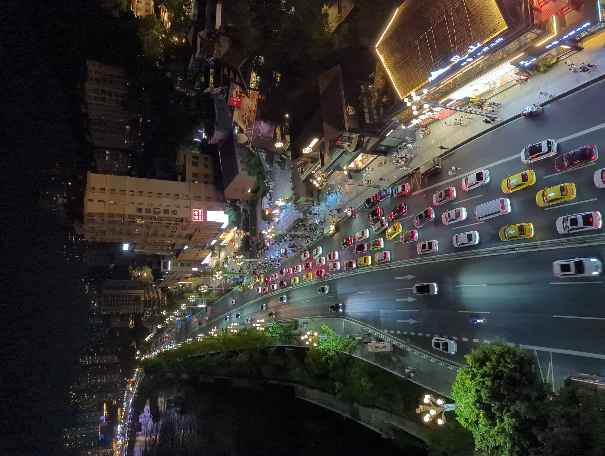 Chongqing at night: rivers, roads, and glowing hillsides