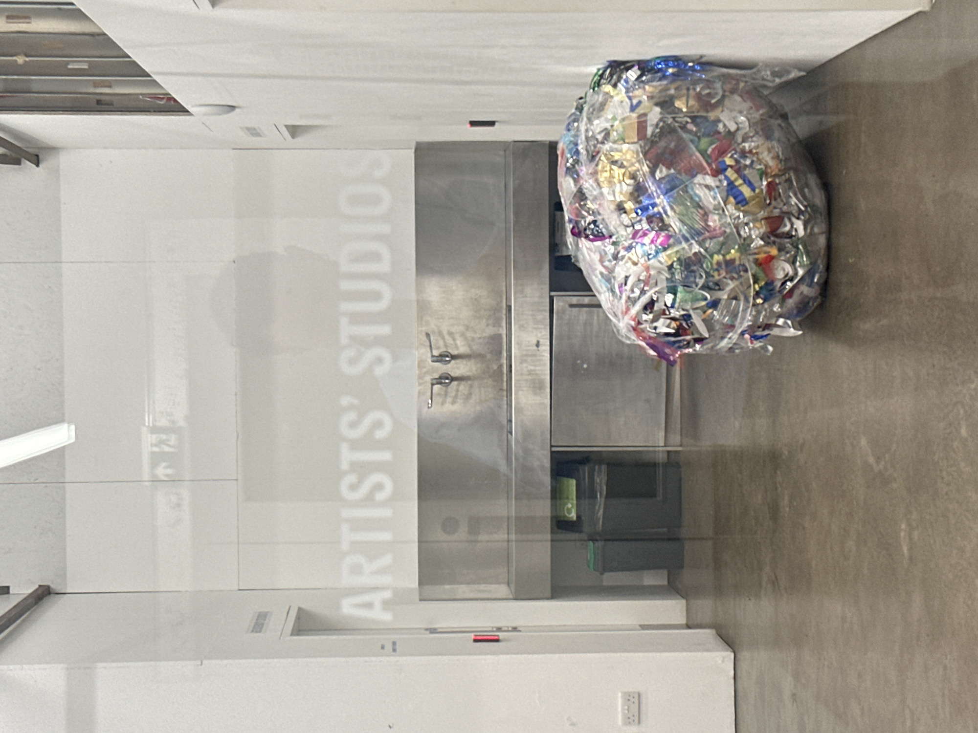 Artist studio workspace documented in London with materials collection