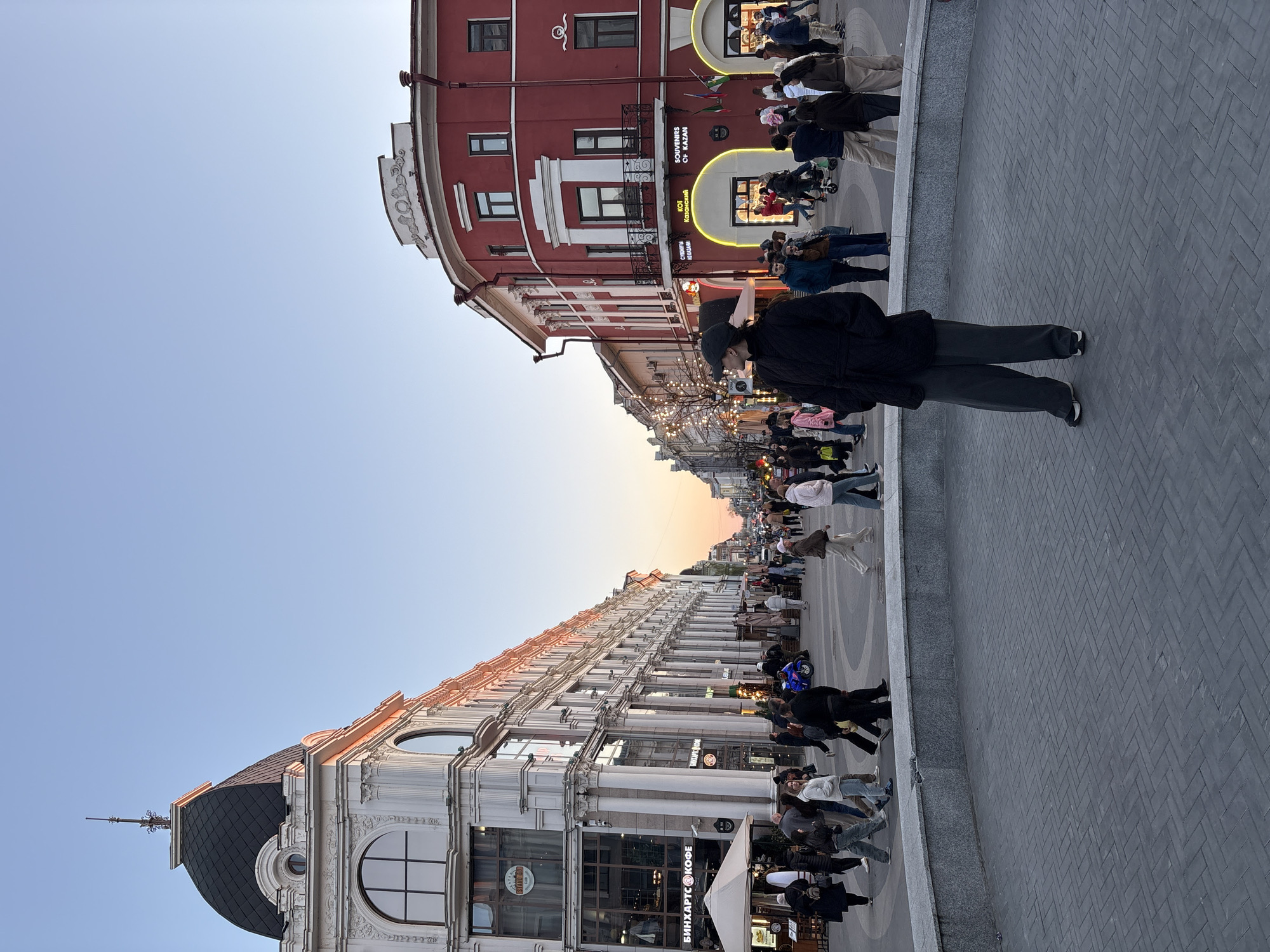 Tourists and locals captured strolling historic Kazan street district