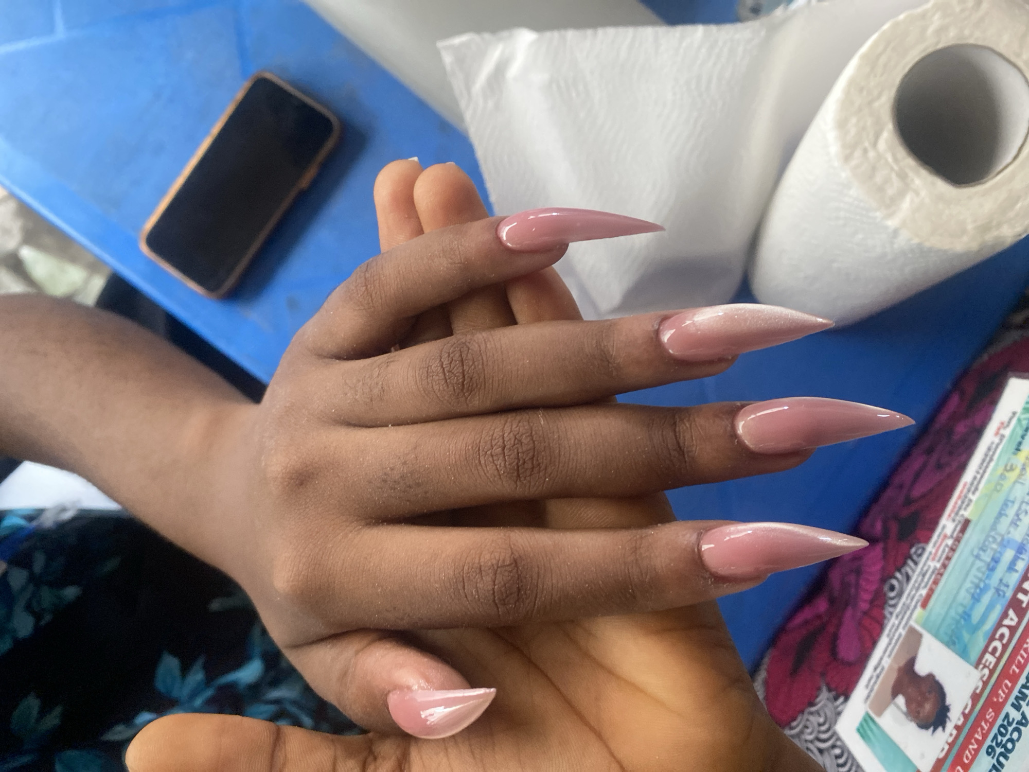 Nail service session documented in Badagry, Nigeria