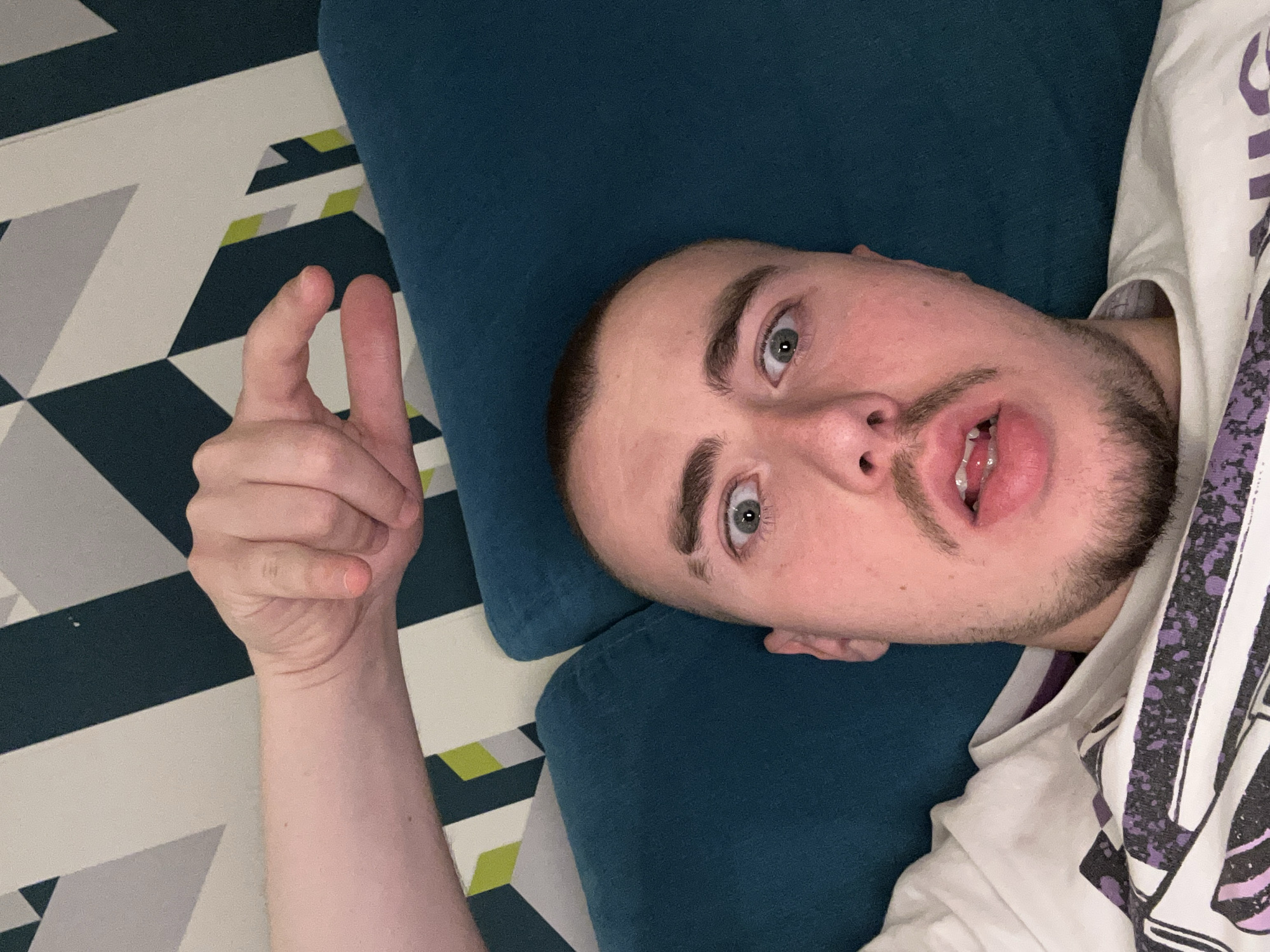 Young man photographed resting on pillow in Sofia