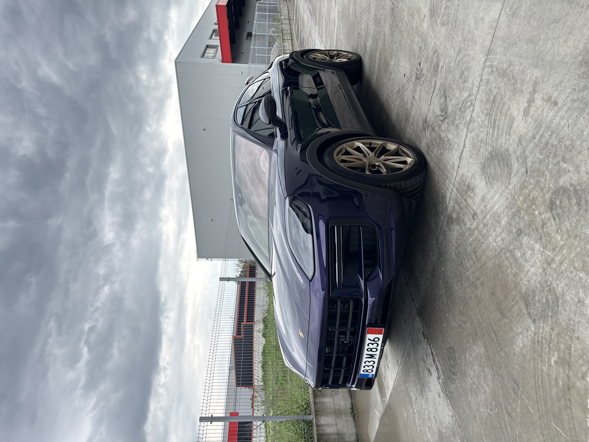 Porsche SUV spotted parked in Plovdiv during overcast conditions