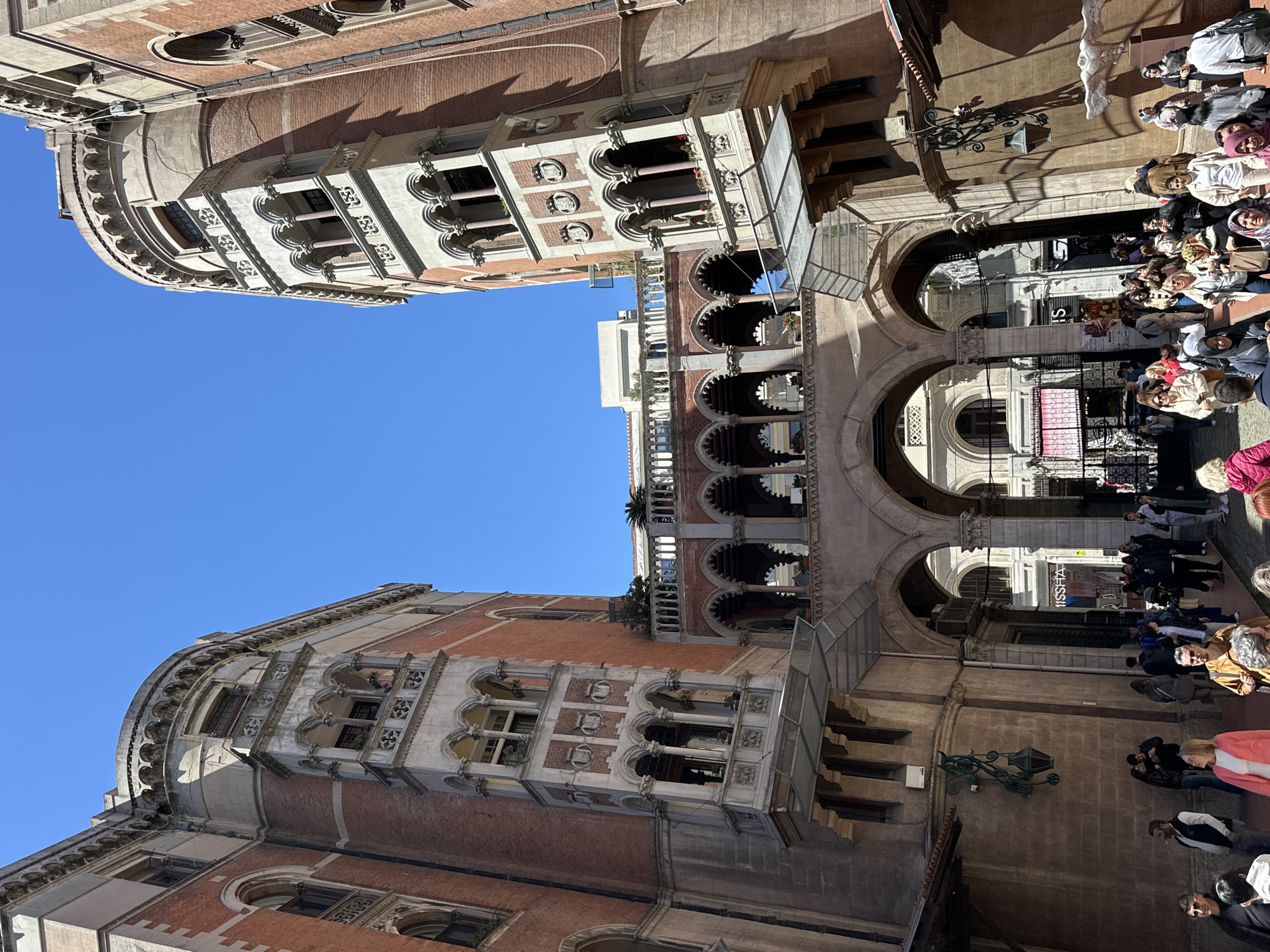 Tourist documents historic church architecture in Istanbul's Beyoğlu district